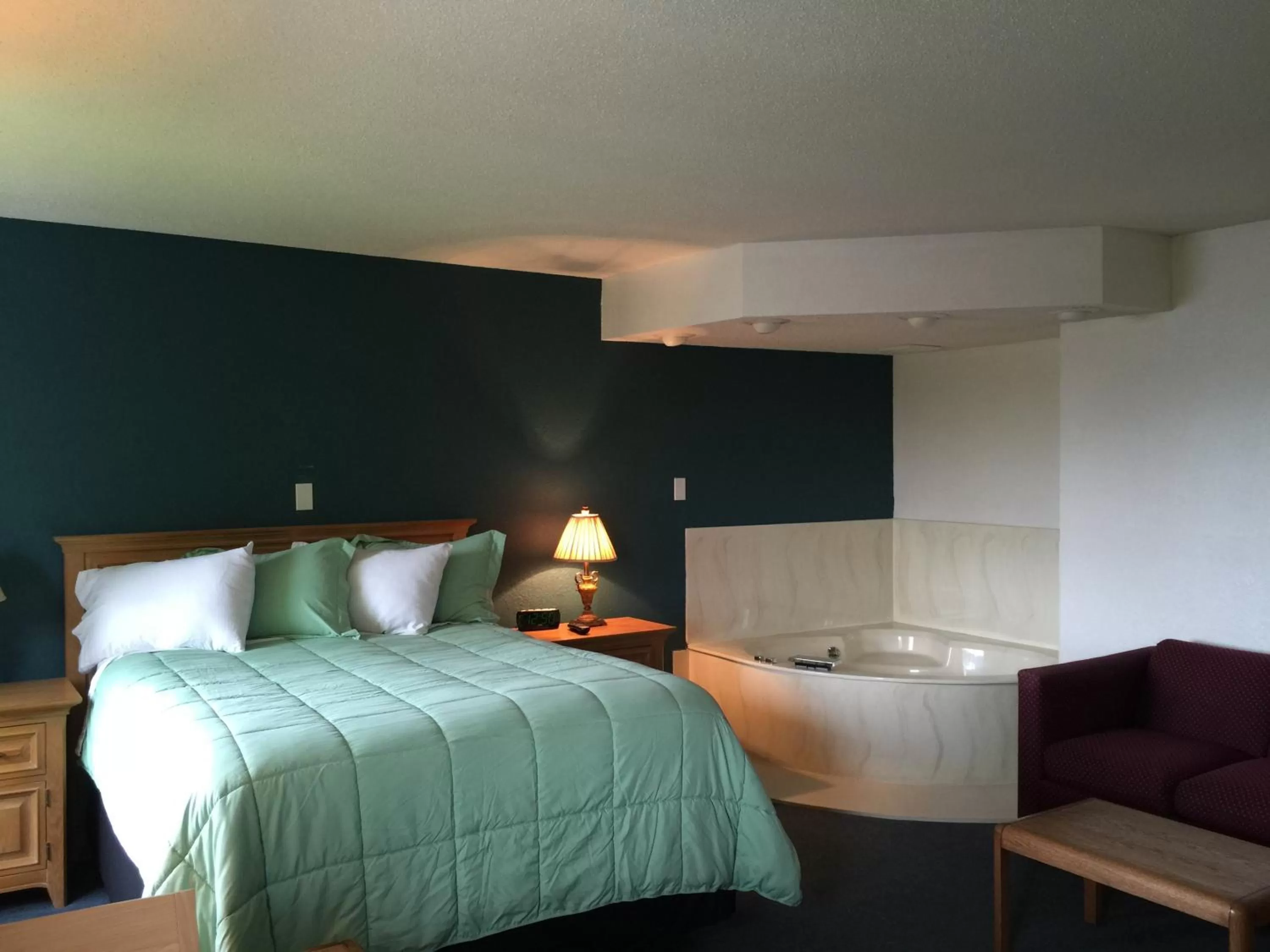 Bed in AmericInn Motel - Monticello