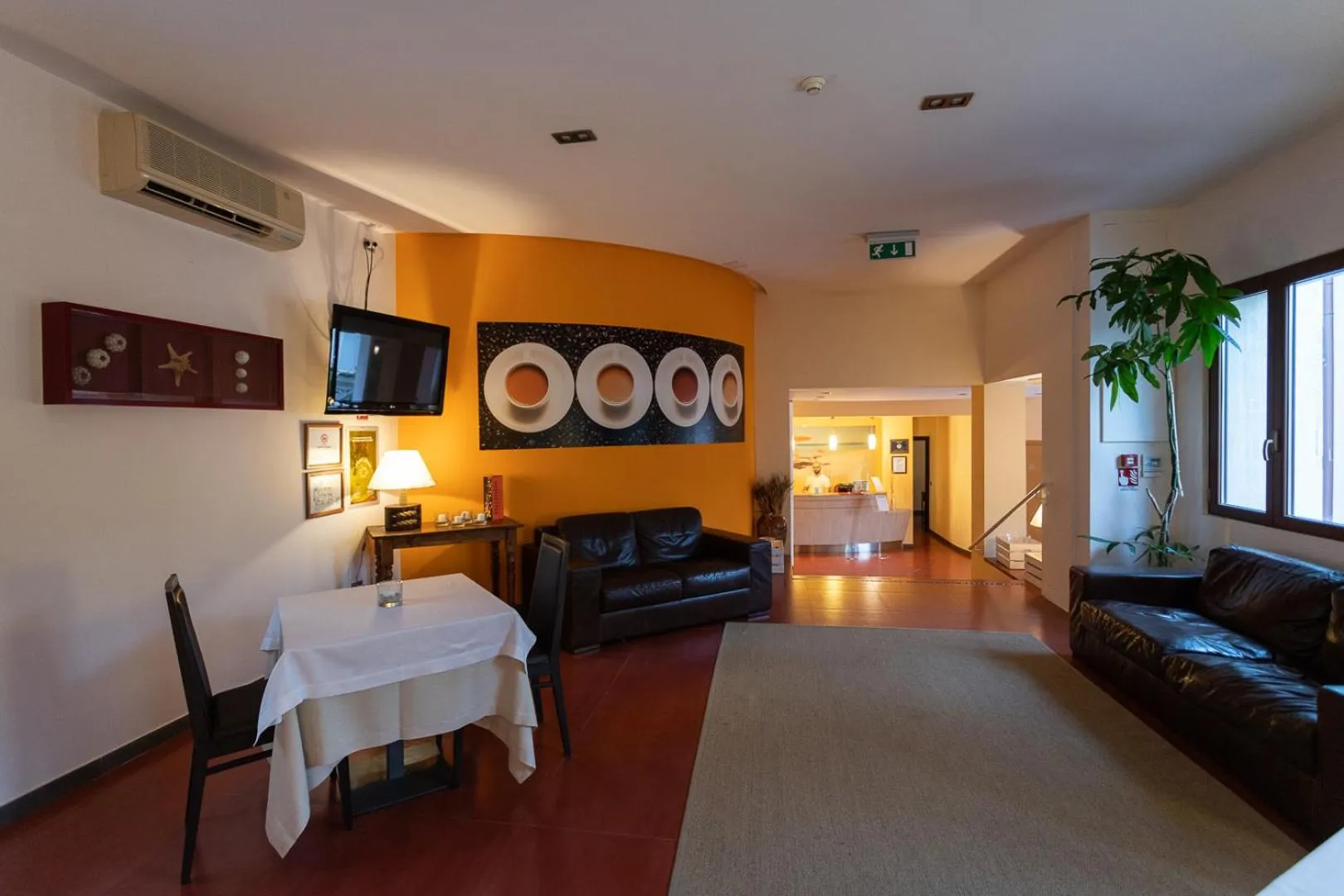 Communal lounge/ TV room, Bed in Club Azzurro Hotel & Resort