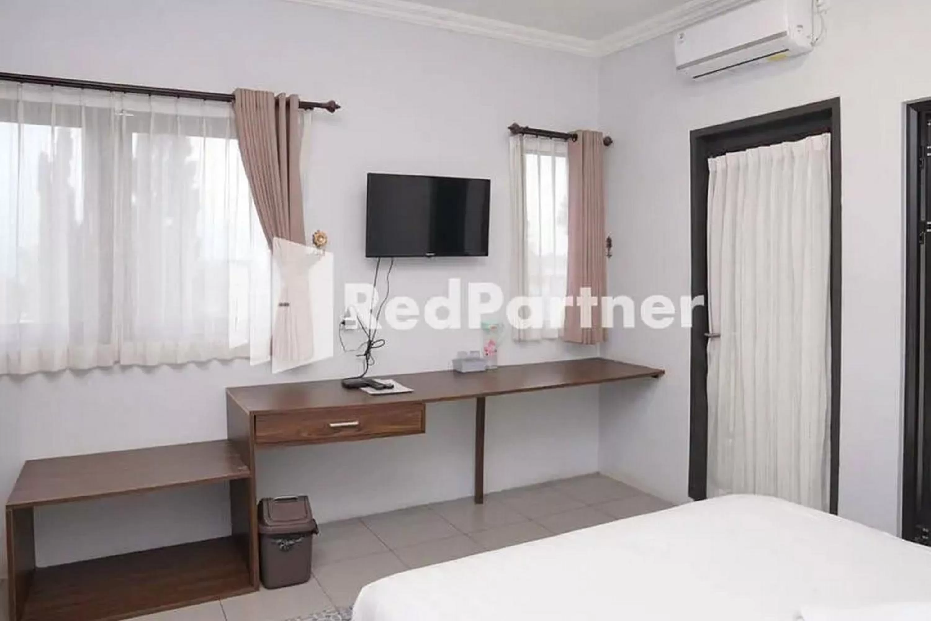 Bed in Panorama Inn Residence Batu Redpartner