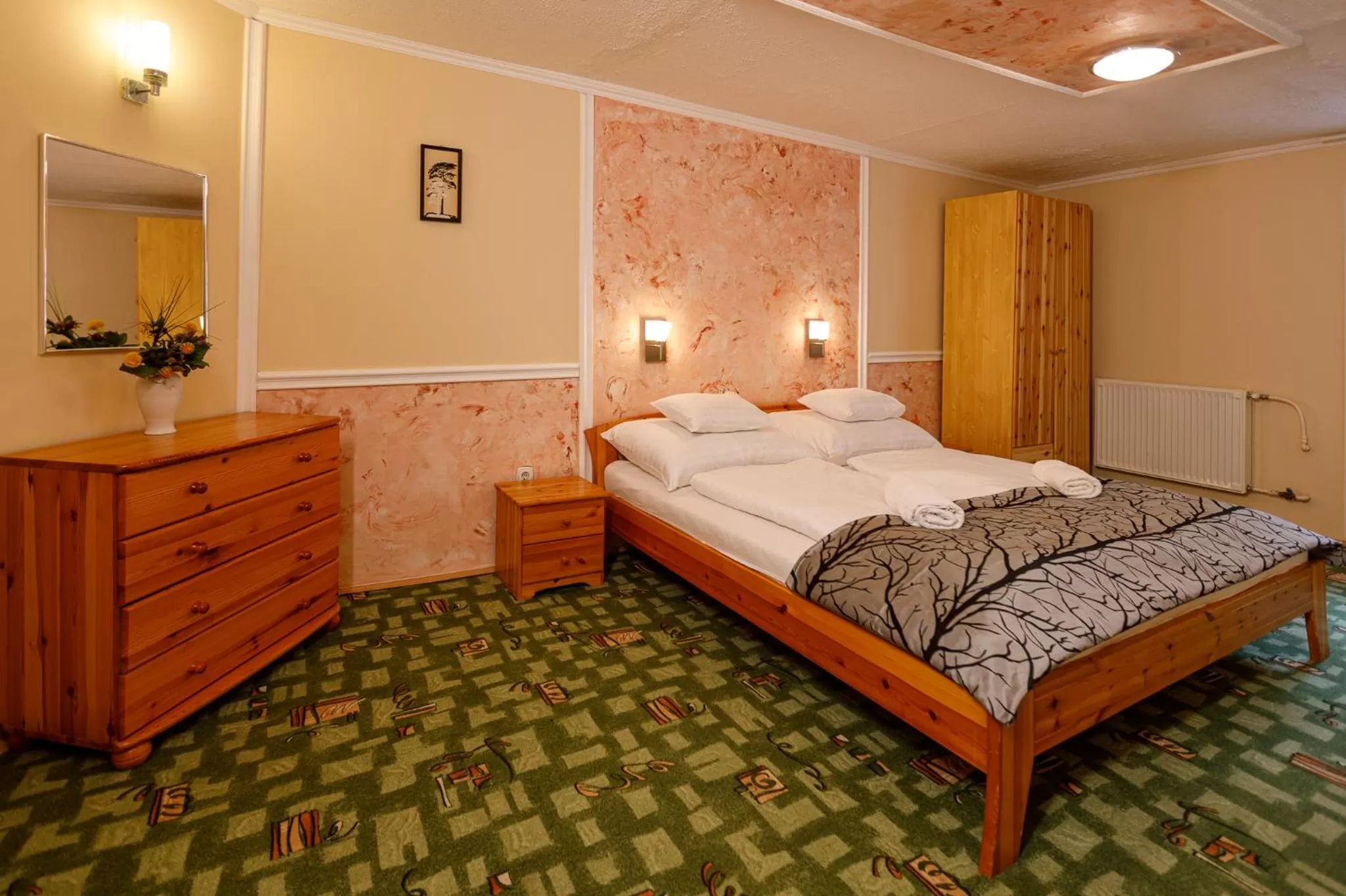 Bed in Central Panzió Gyula