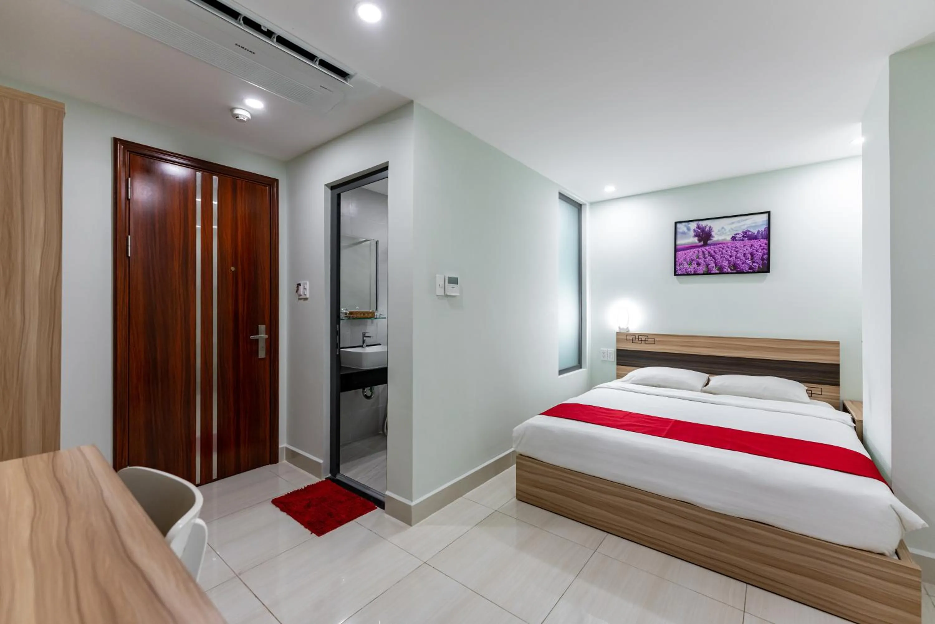 Bed in Cherry Hotel and Apartment