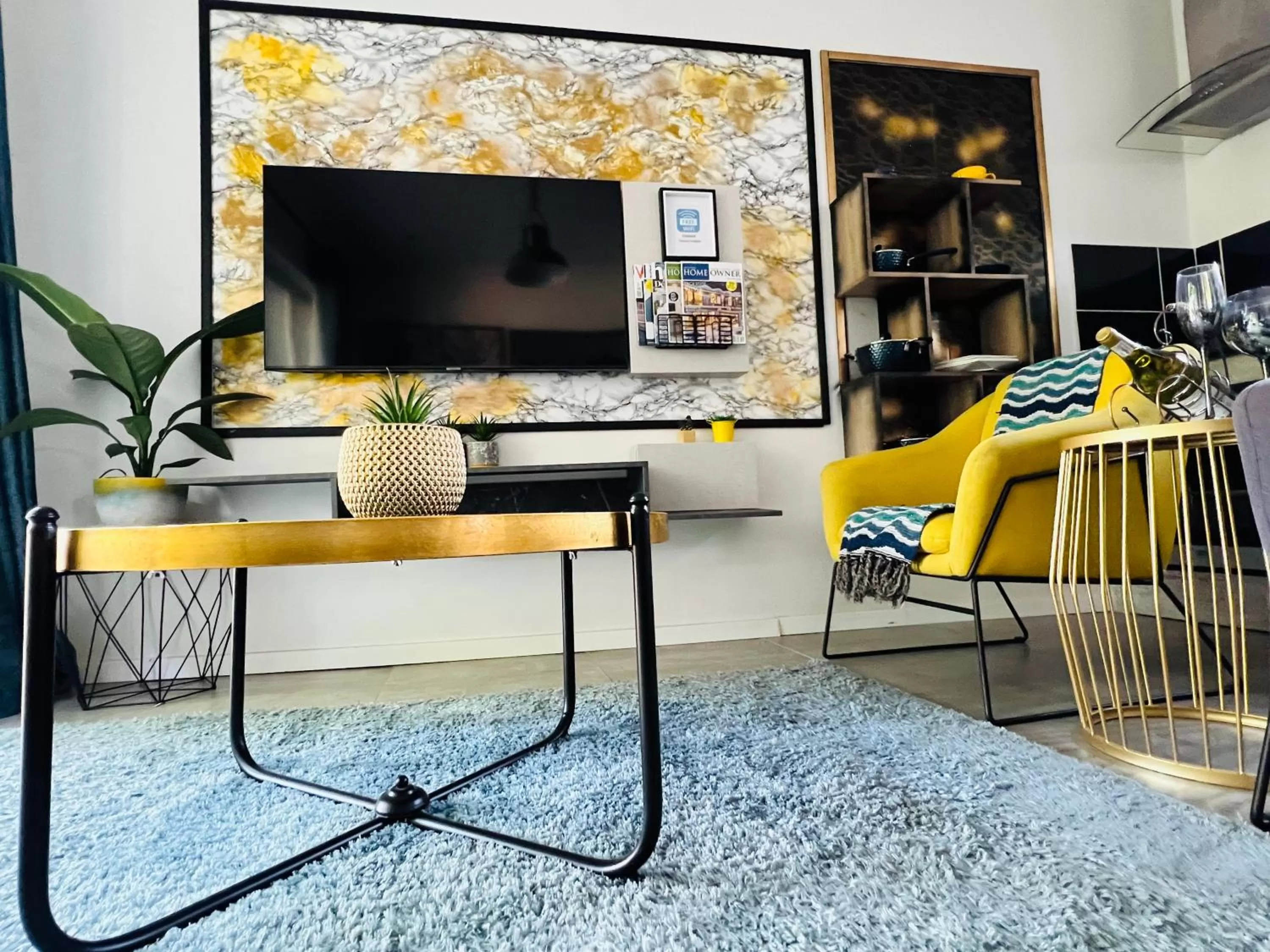 TV/Entertainment Center in 24 On Basil Inventive suites