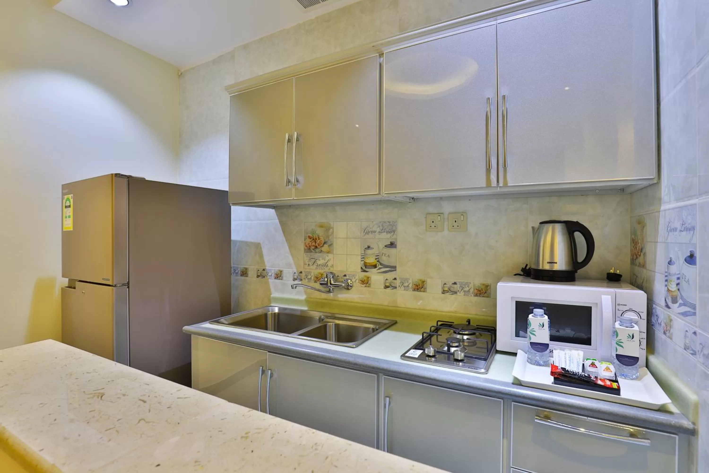 Kitchen or kitchenette, Kitchen/Kitchenette in Dreams Houses furnished Suites