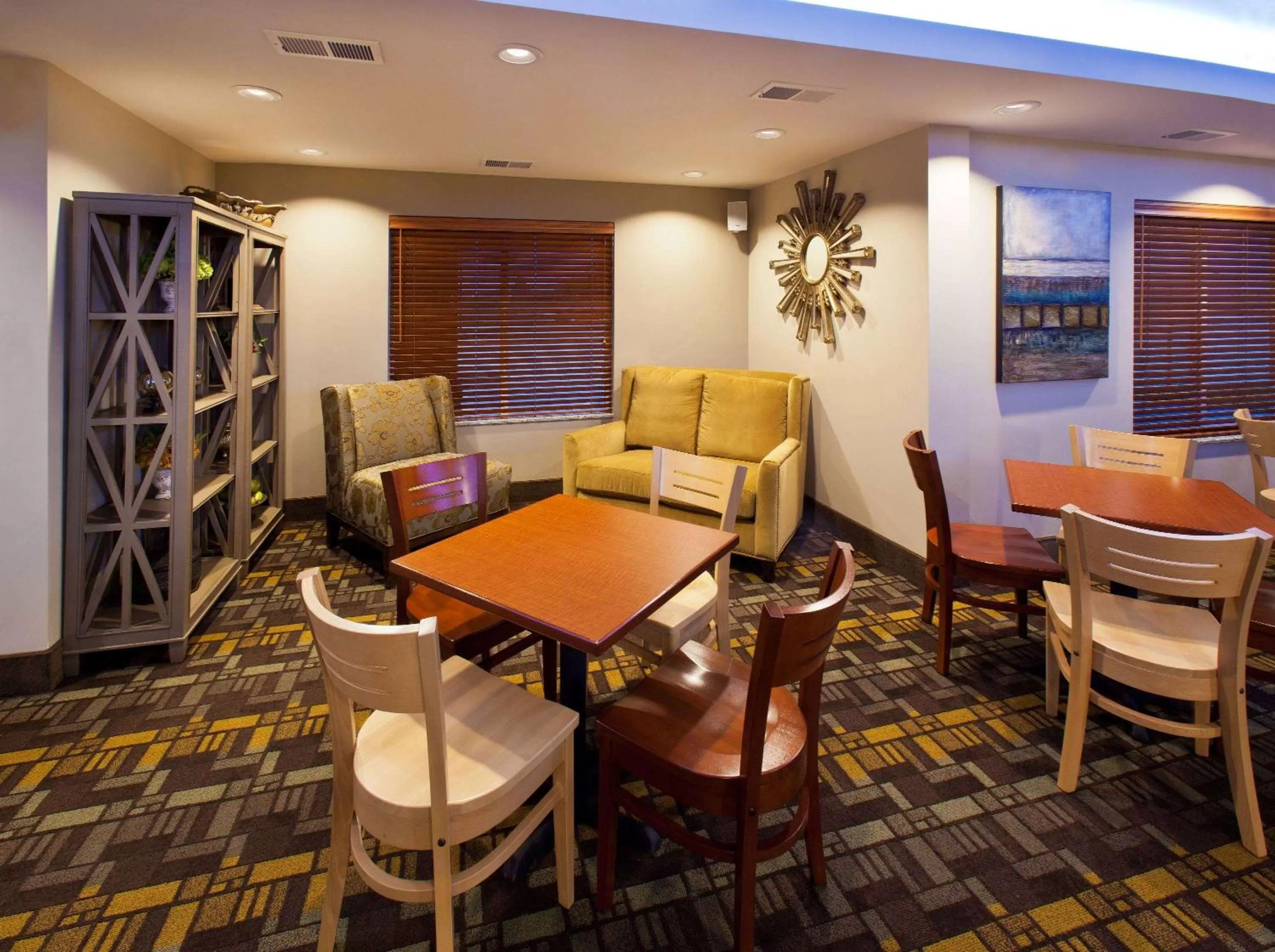 Seating area in AmericInn by Wyndham Fairfield