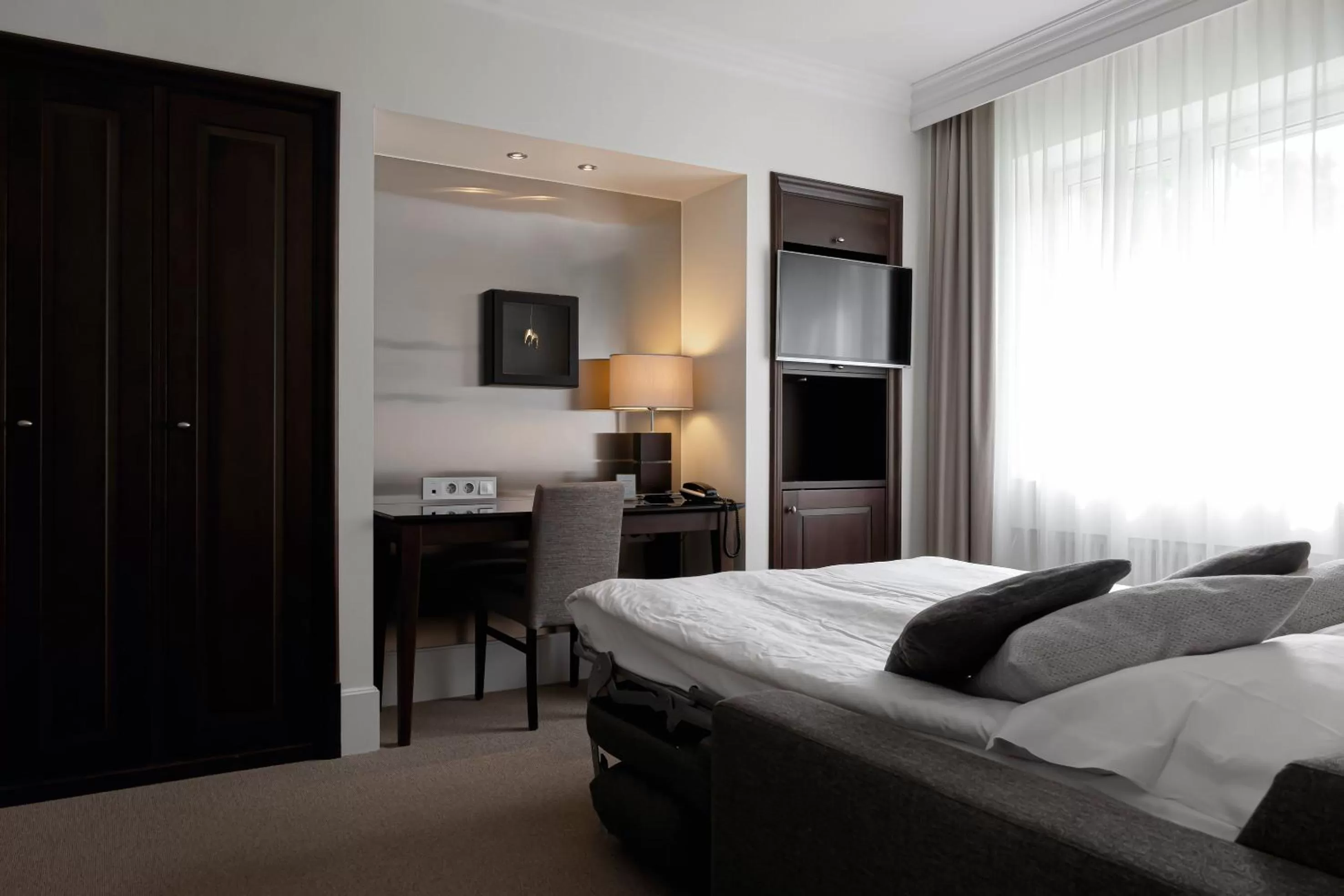 Bed in Elite Park Avenue Hotel