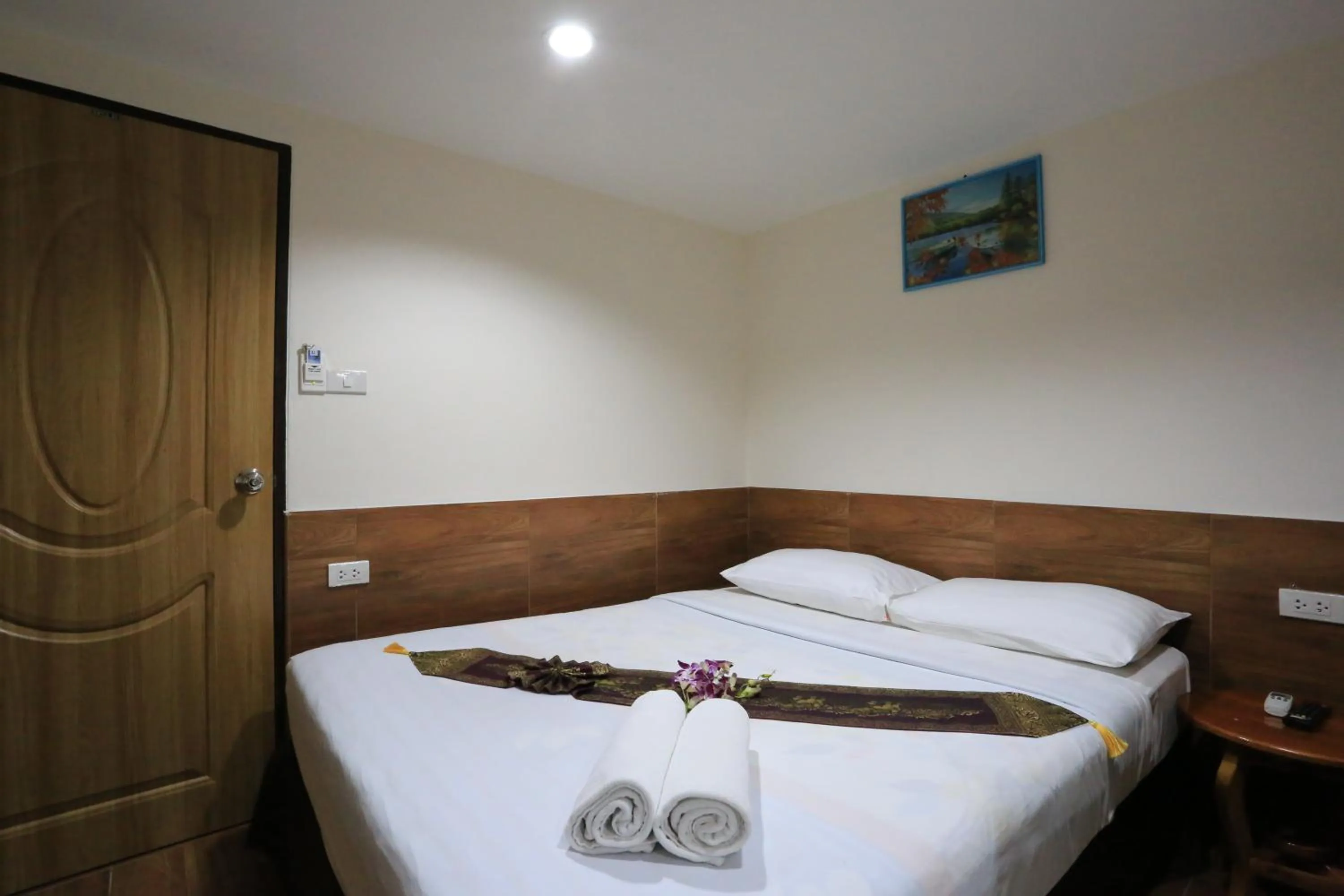 Bed in The Siam Guest House - SHA Extra Plus