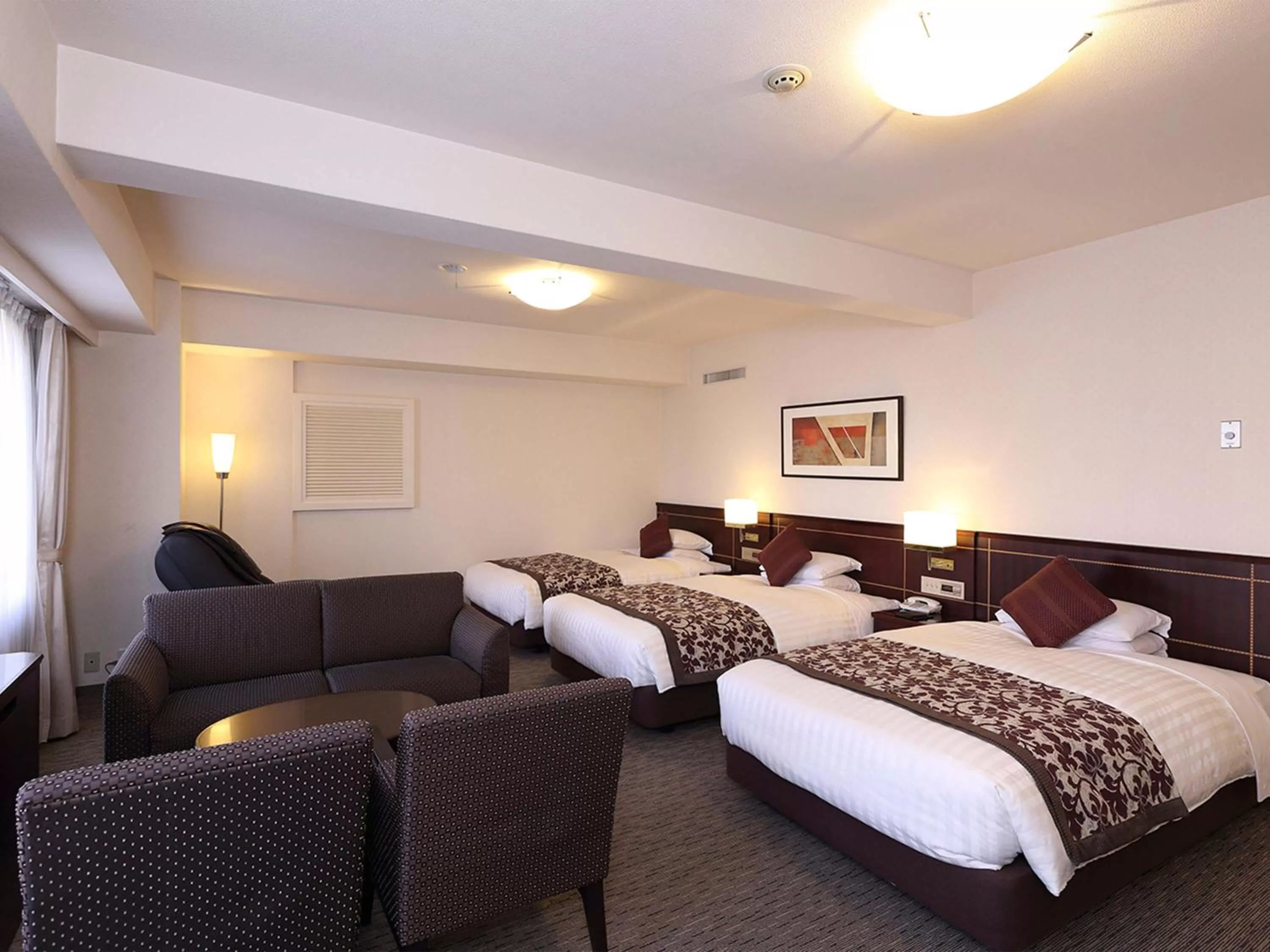 Photo of the whole room, Bed in Nishitetsu Grand Hotel