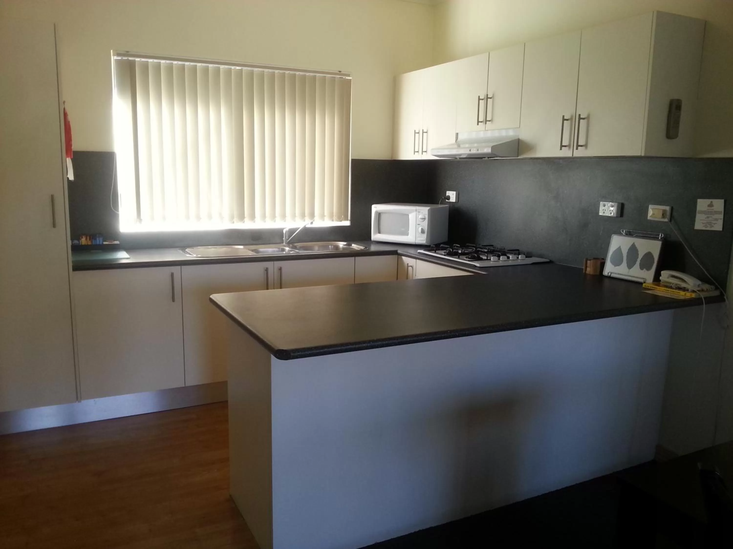 Kitchen or kitchenette in Alice On Todd Apartments