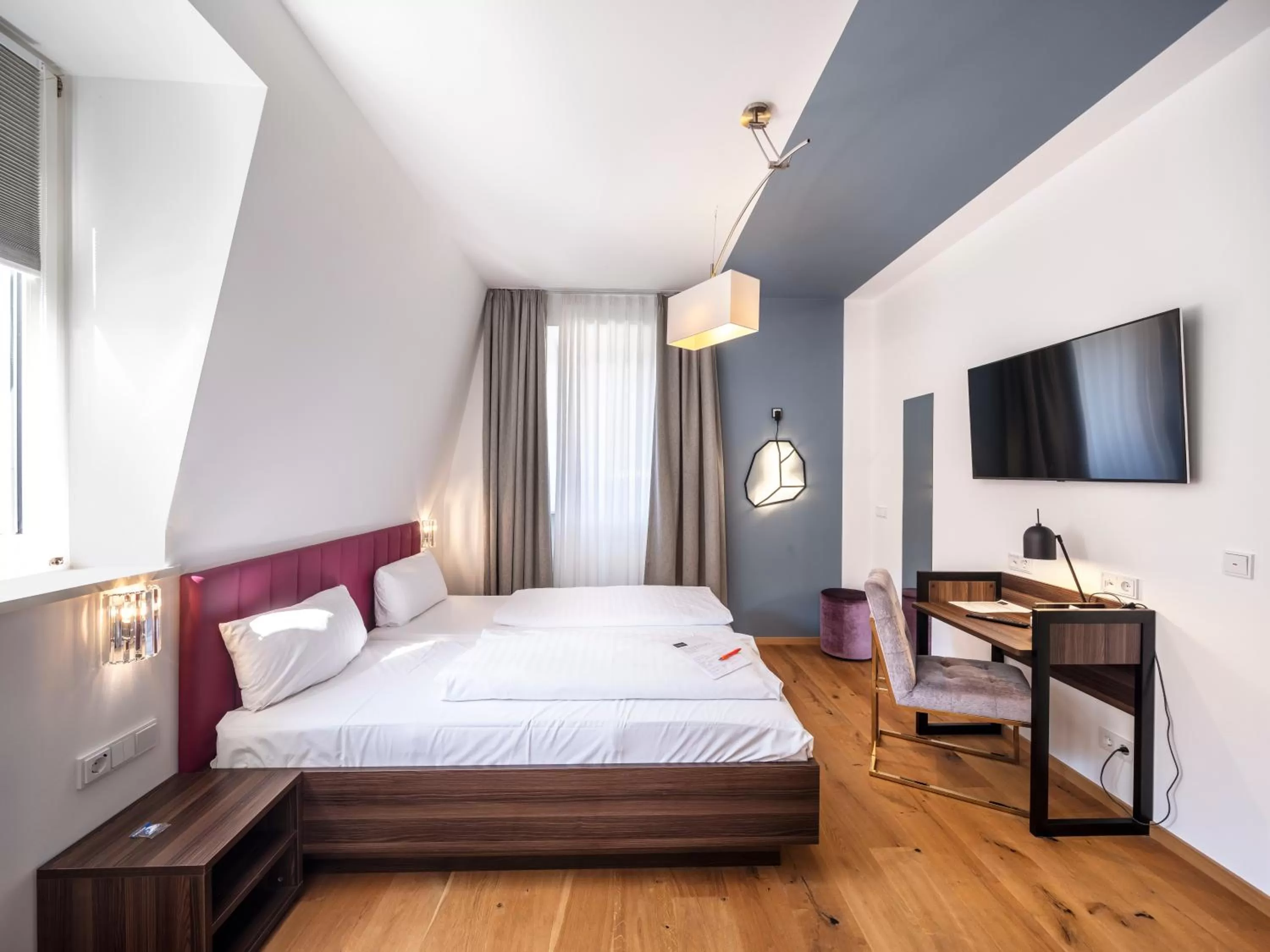 Bed in acor Boutique Hotel