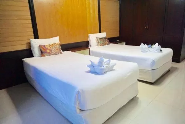 Bed in Suppamitr Villa Hotel