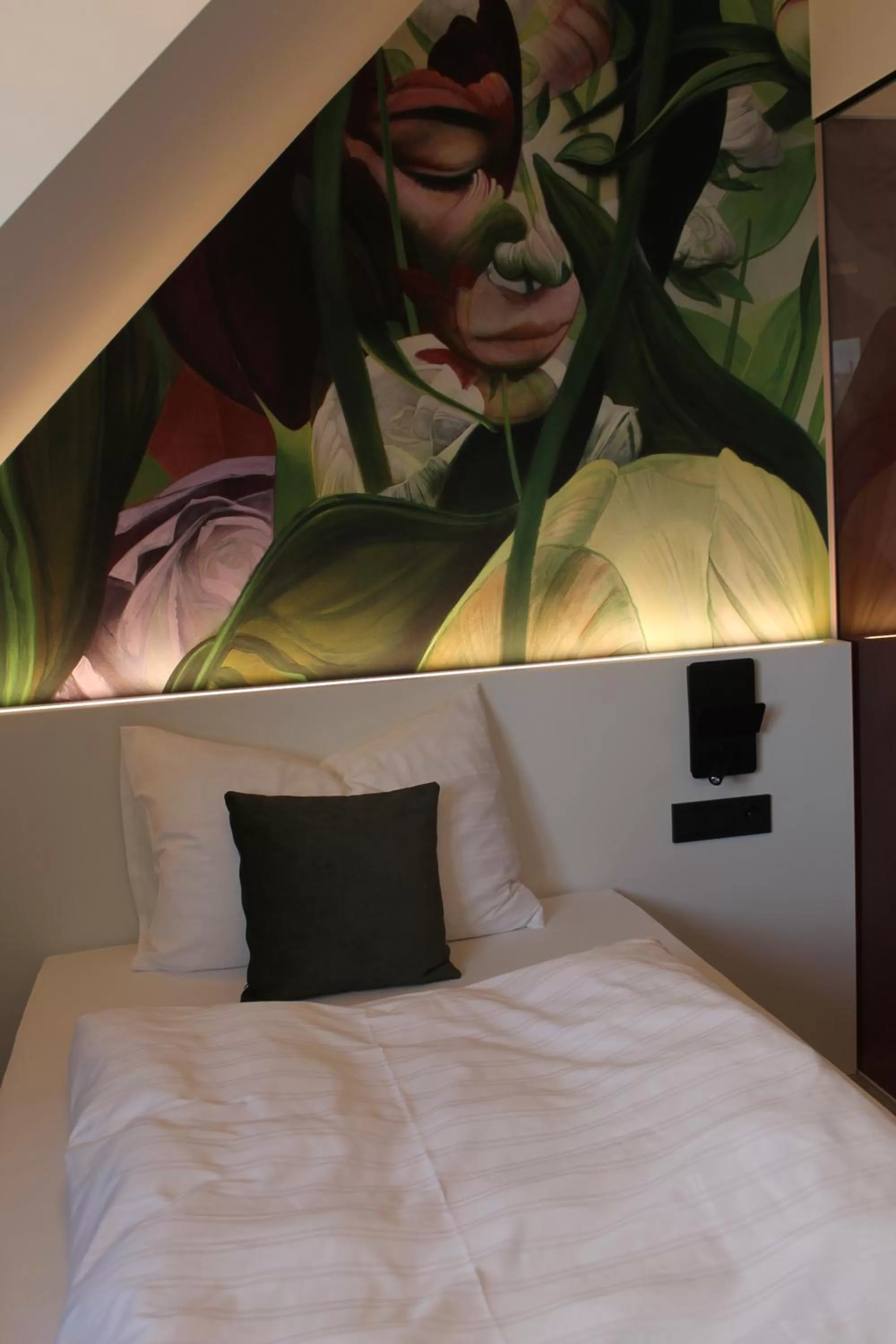 Bed in ART-INN Design Self-Check-in-Hotel