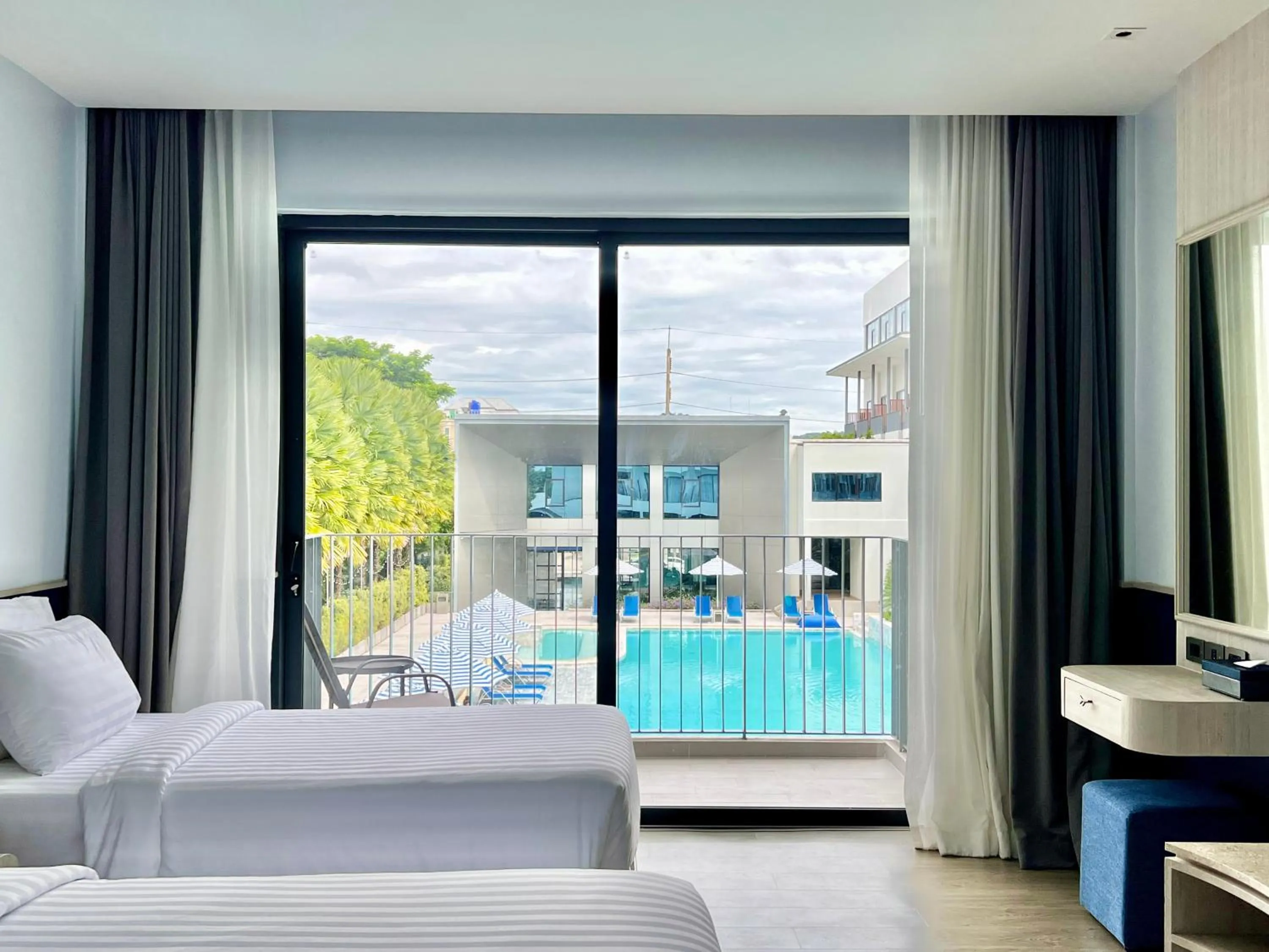 Pool view, Bed in Seabed Grand Hotel Phuket - SHA Extra Plus