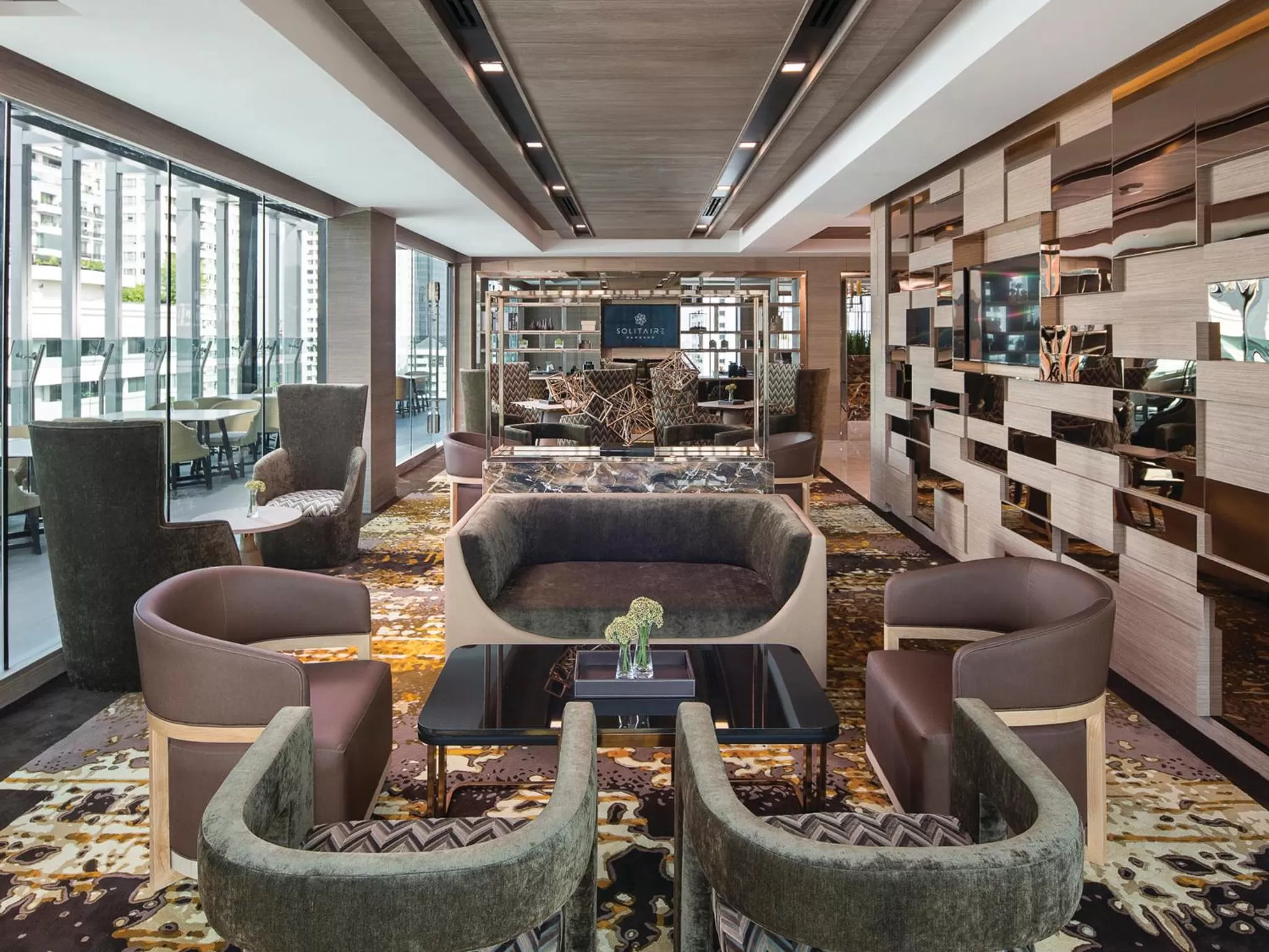 Lounge or bar in Solitaire Bangkok Sukhumvit 11