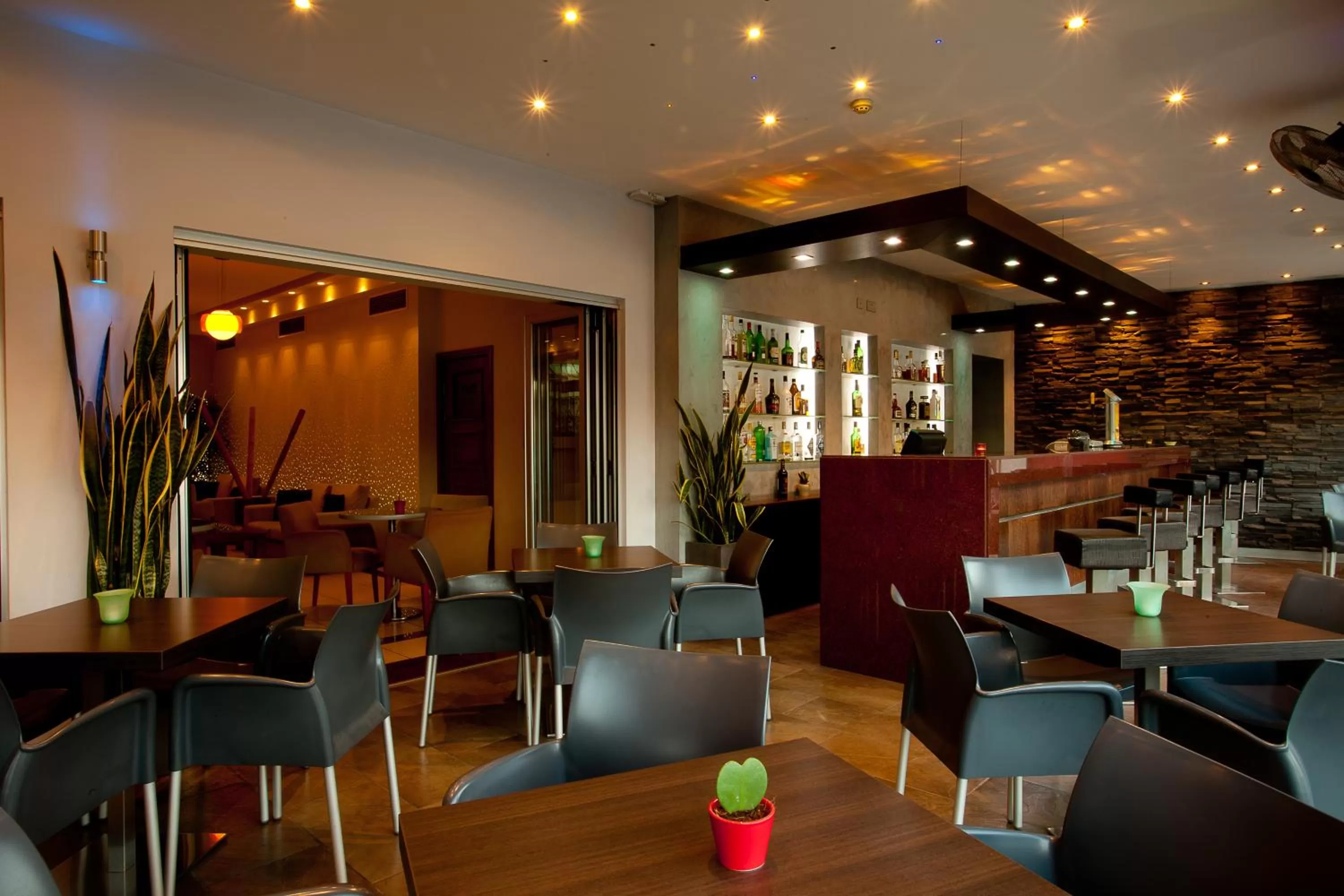 Communal lounge/ TV room in Pyramos Hotel