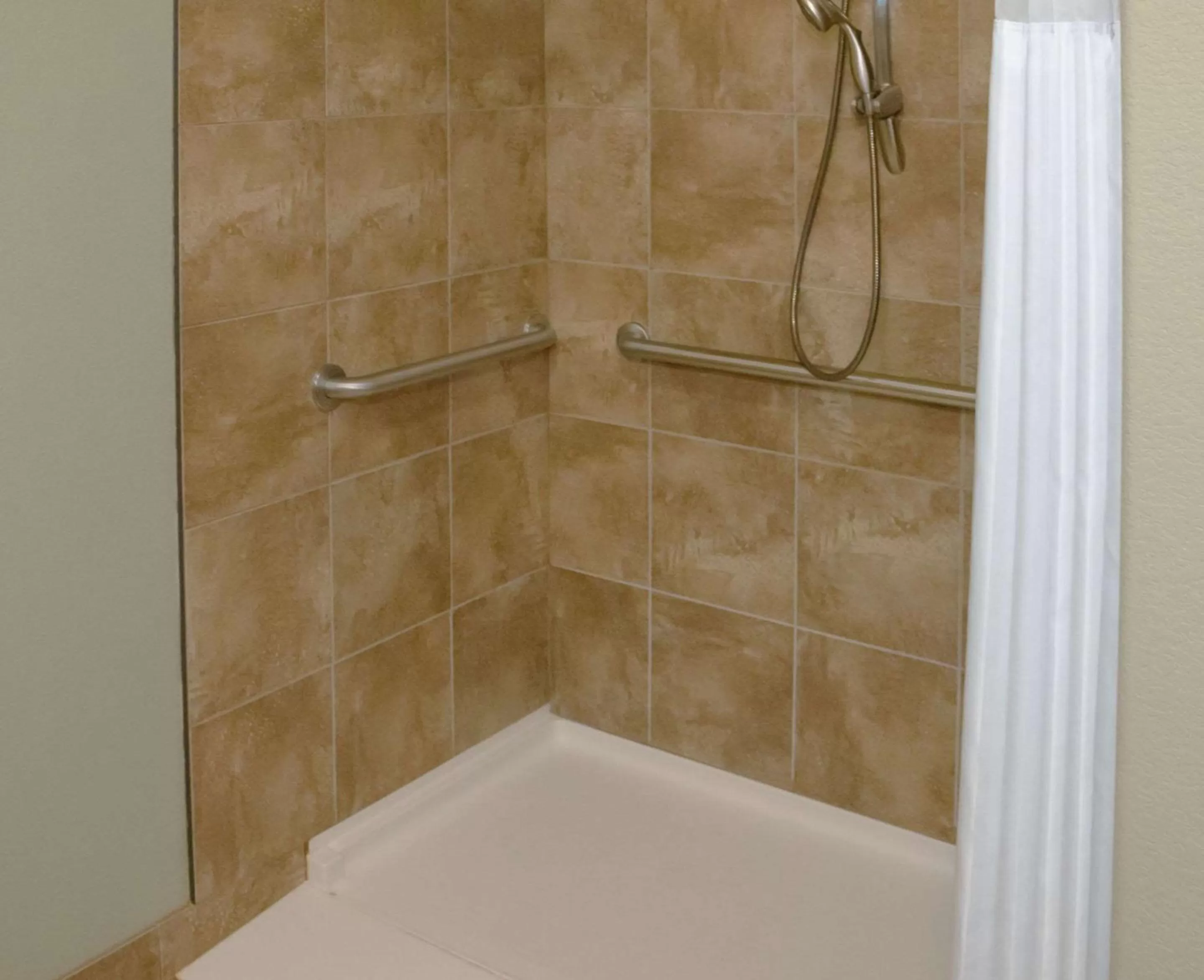 Bedroom in Grand Forks Lodge and Suites