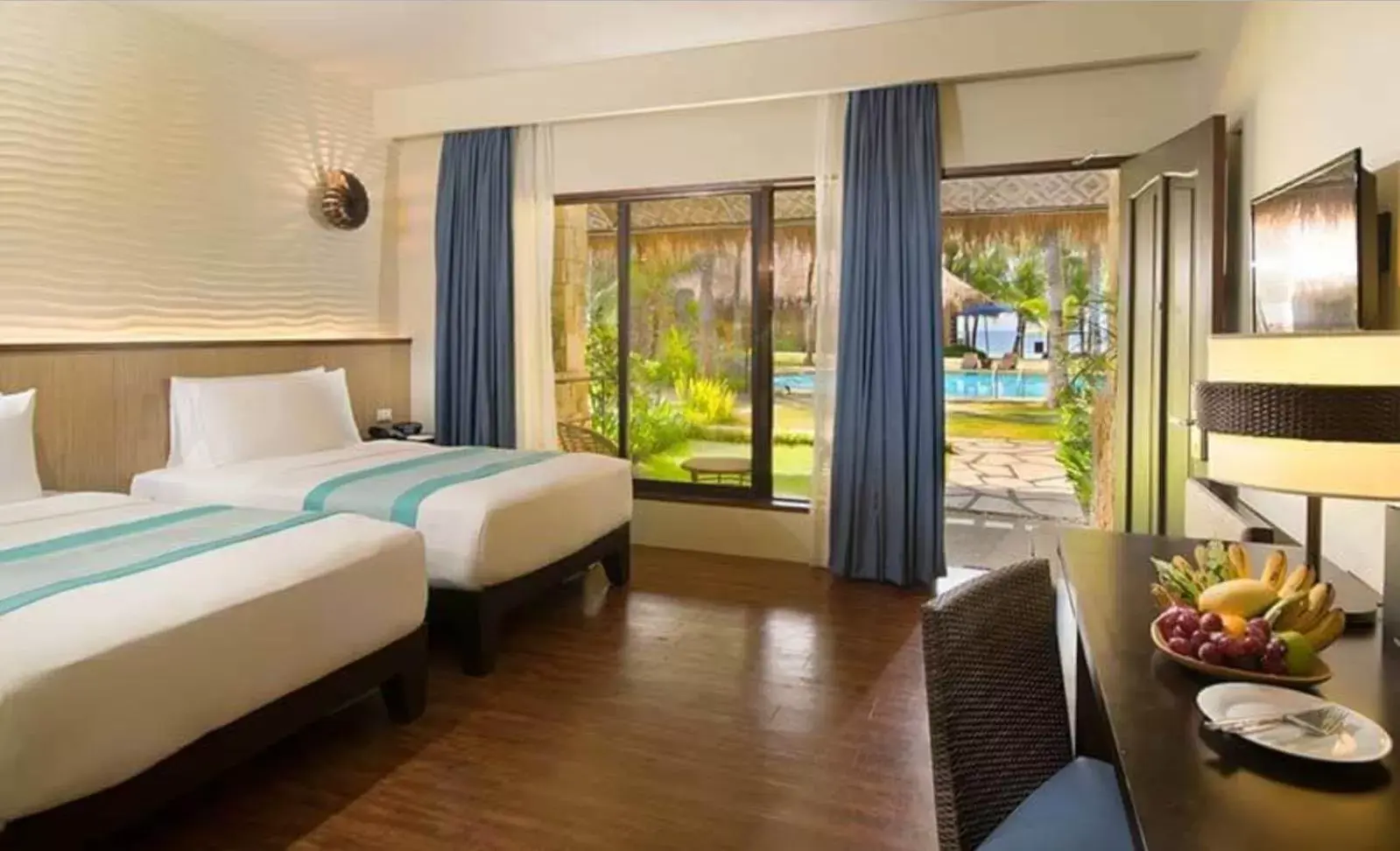 Deluxe Double or Twin Room with Pool View in Oceanica Resort Panglao, Bohol Deluxe Double or Twin Room with Pool View in Oceanica Resort Panglao, Bohol