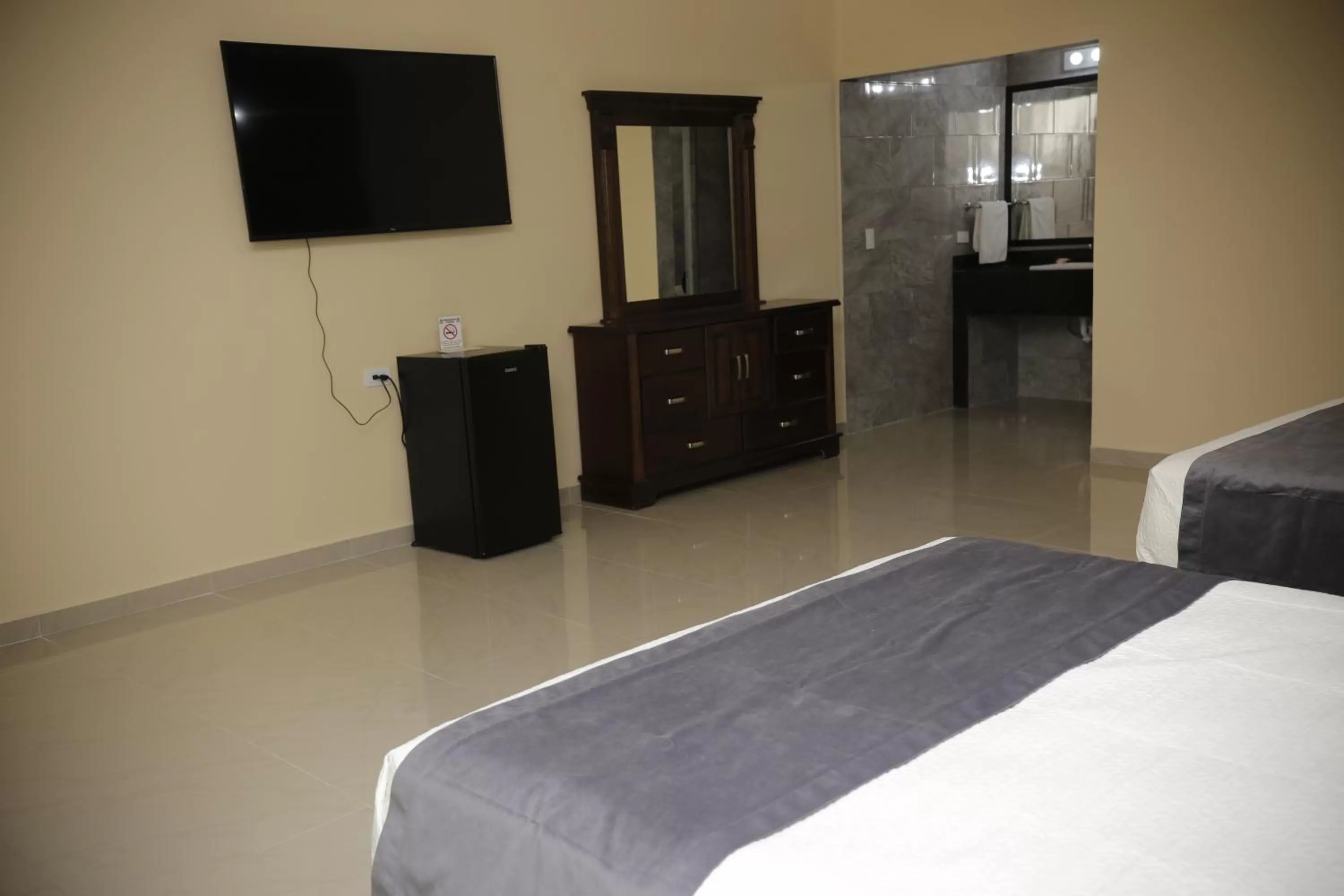 Bed in Hotel Posada Santa Fe Sabinas