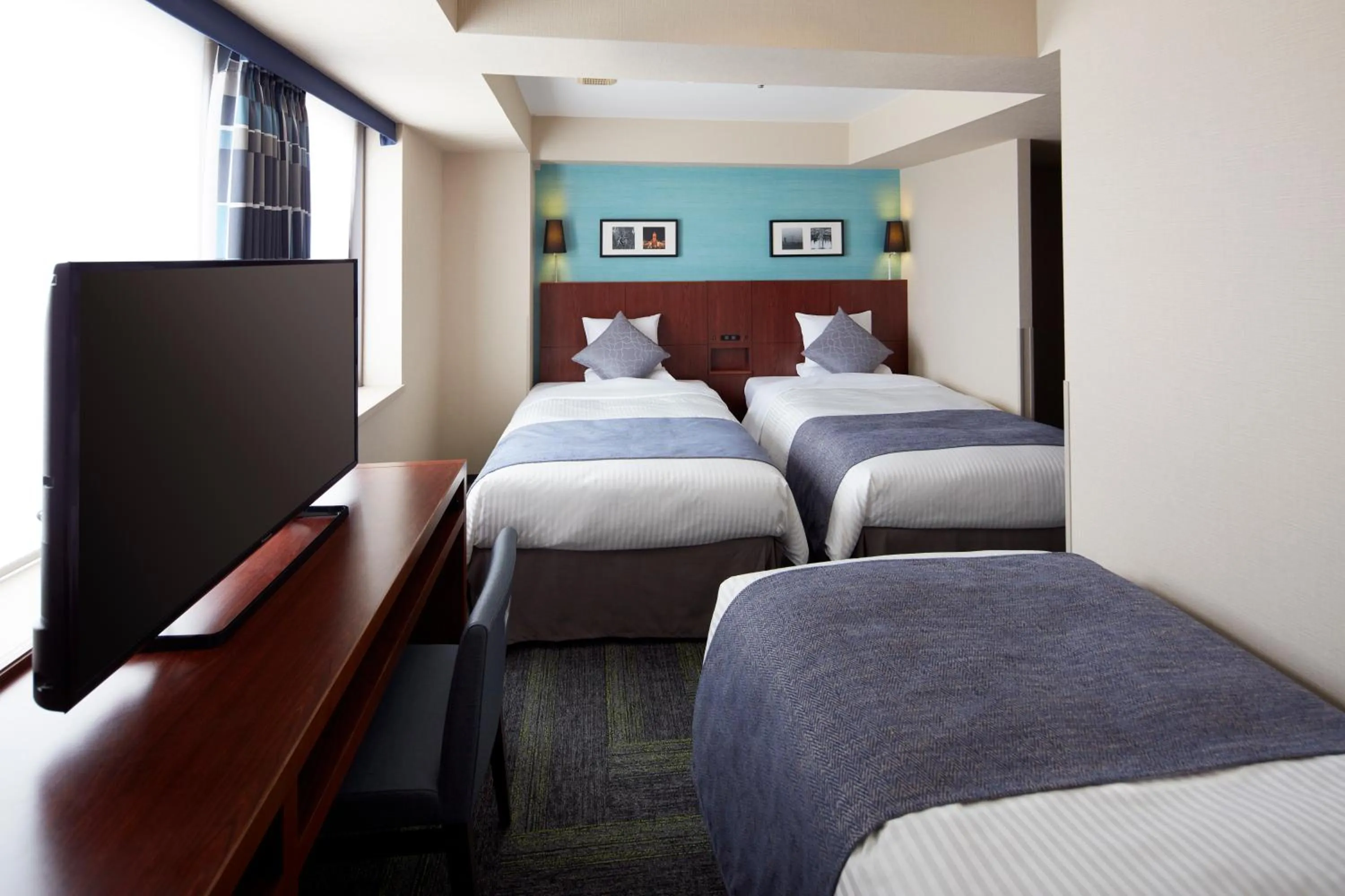 Bed in HOTEL MYSTAYS Yokohama