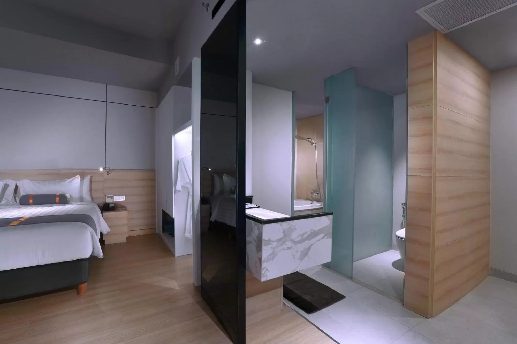 Bathroom, Bed in Harper Cikarang by ASTON