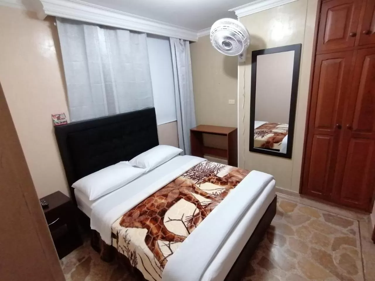 Bed in HOTEL GOLDEN SUITE