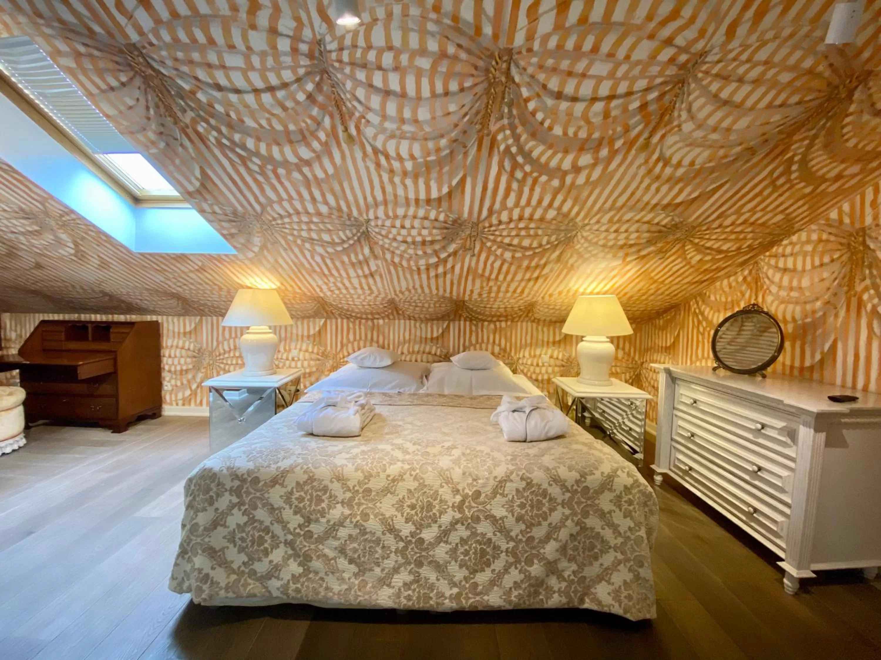 Bed in The Bonerowski Palace Boutique Hotel