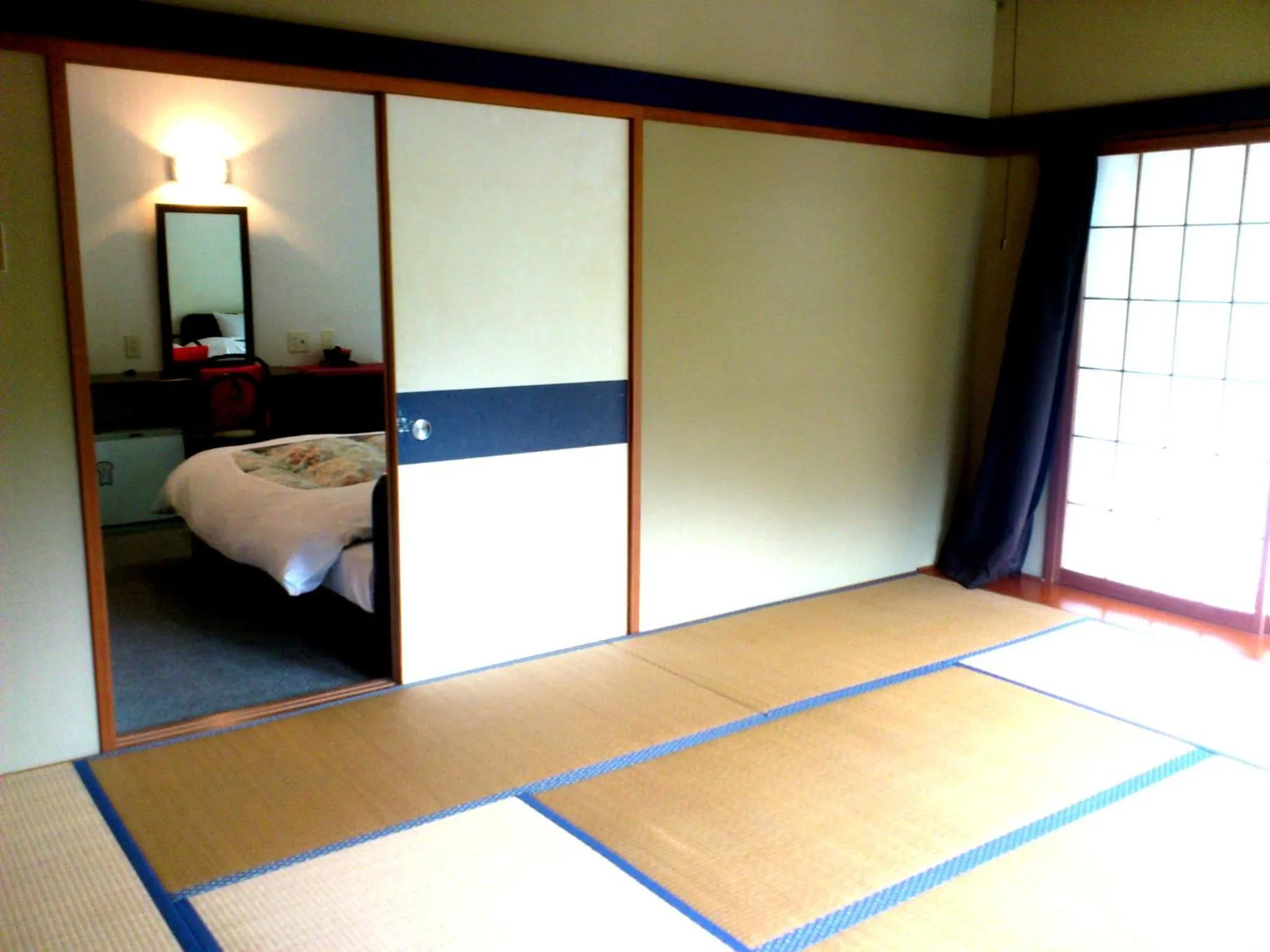 Photo of the whole room, Bed in Tenjin Lodge