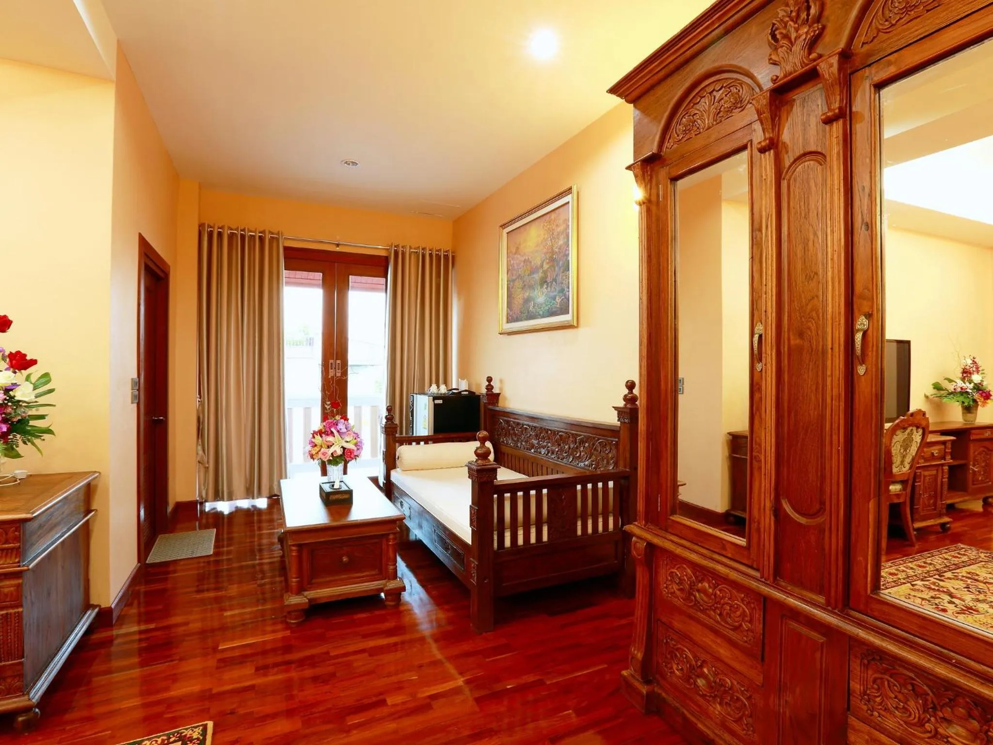 Seating area, Bed in At Chiang Mai Hotel