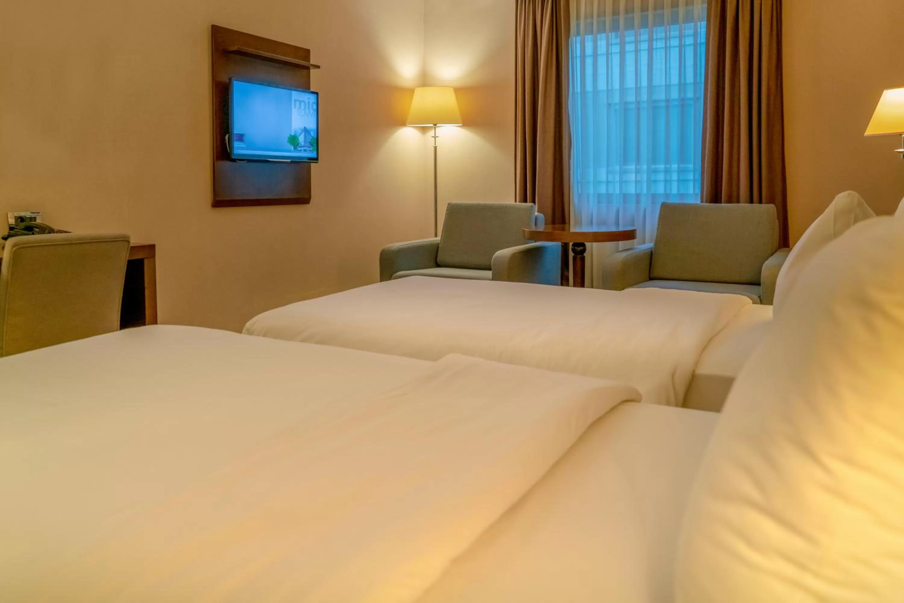 Bed in Midtown Hotel