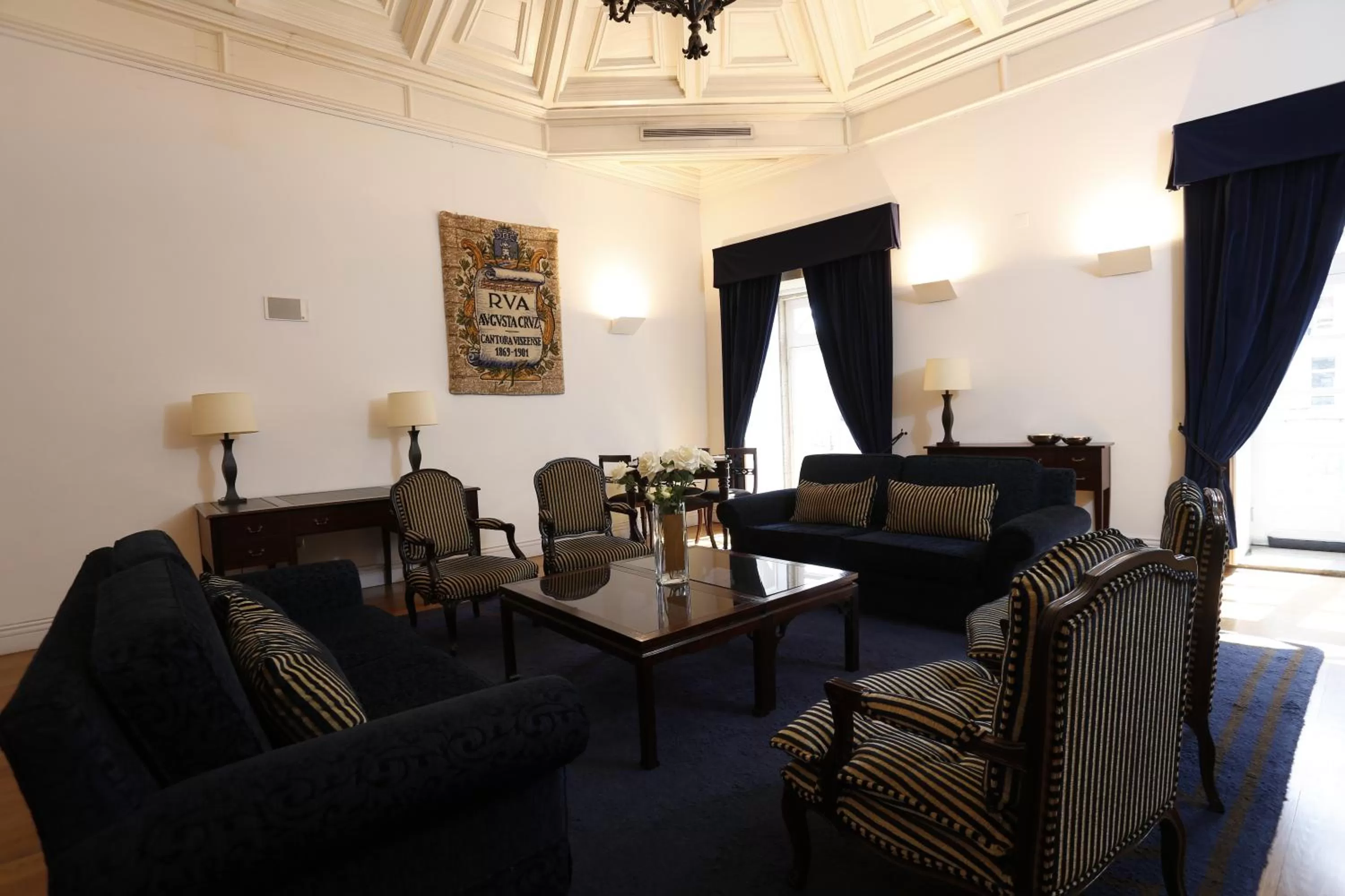 Communal lounge/ TV room in Montebelo Palácio dos Melos Viseu Historic Hotel