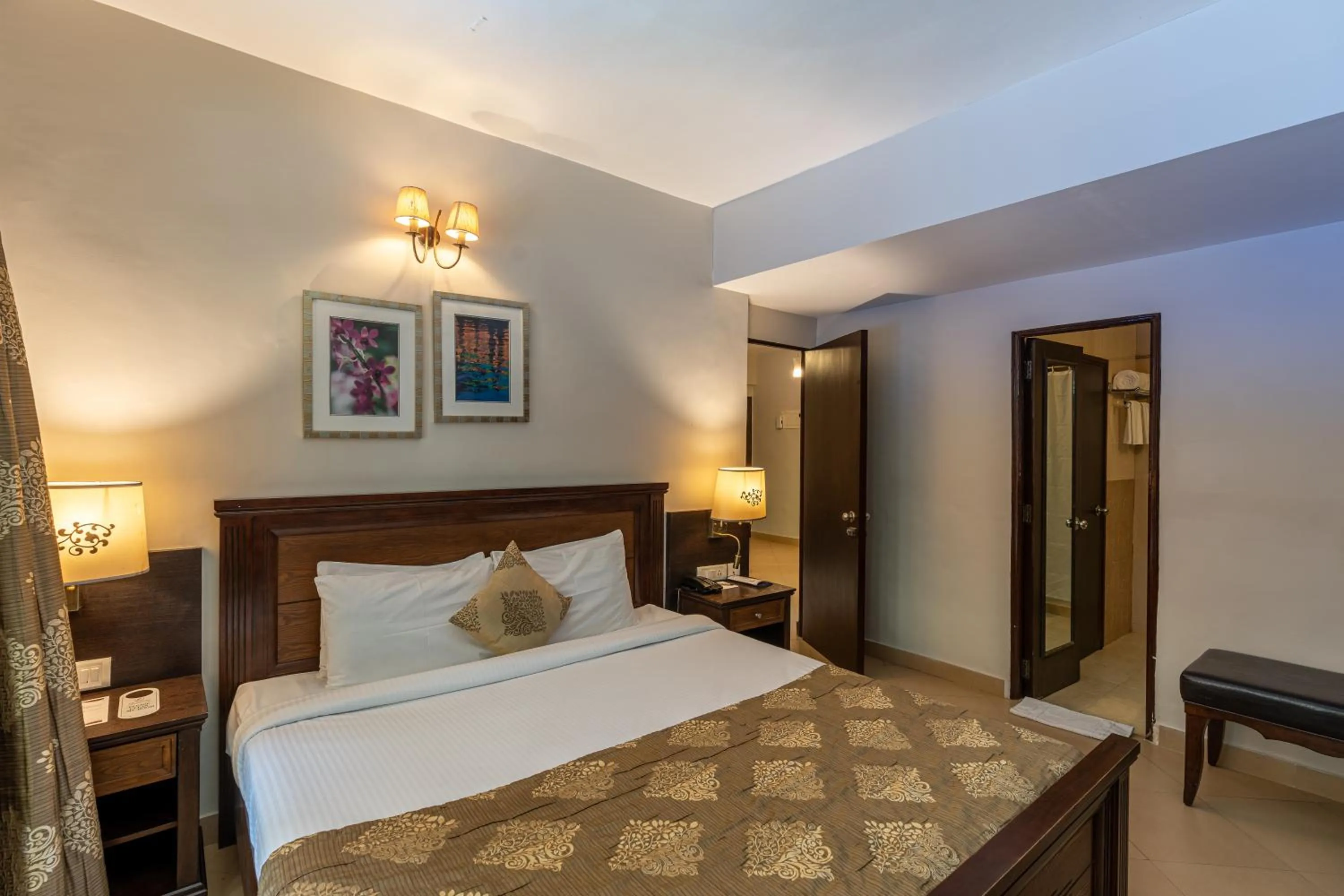 Bed in Neelam's The Grand Hotel Goa