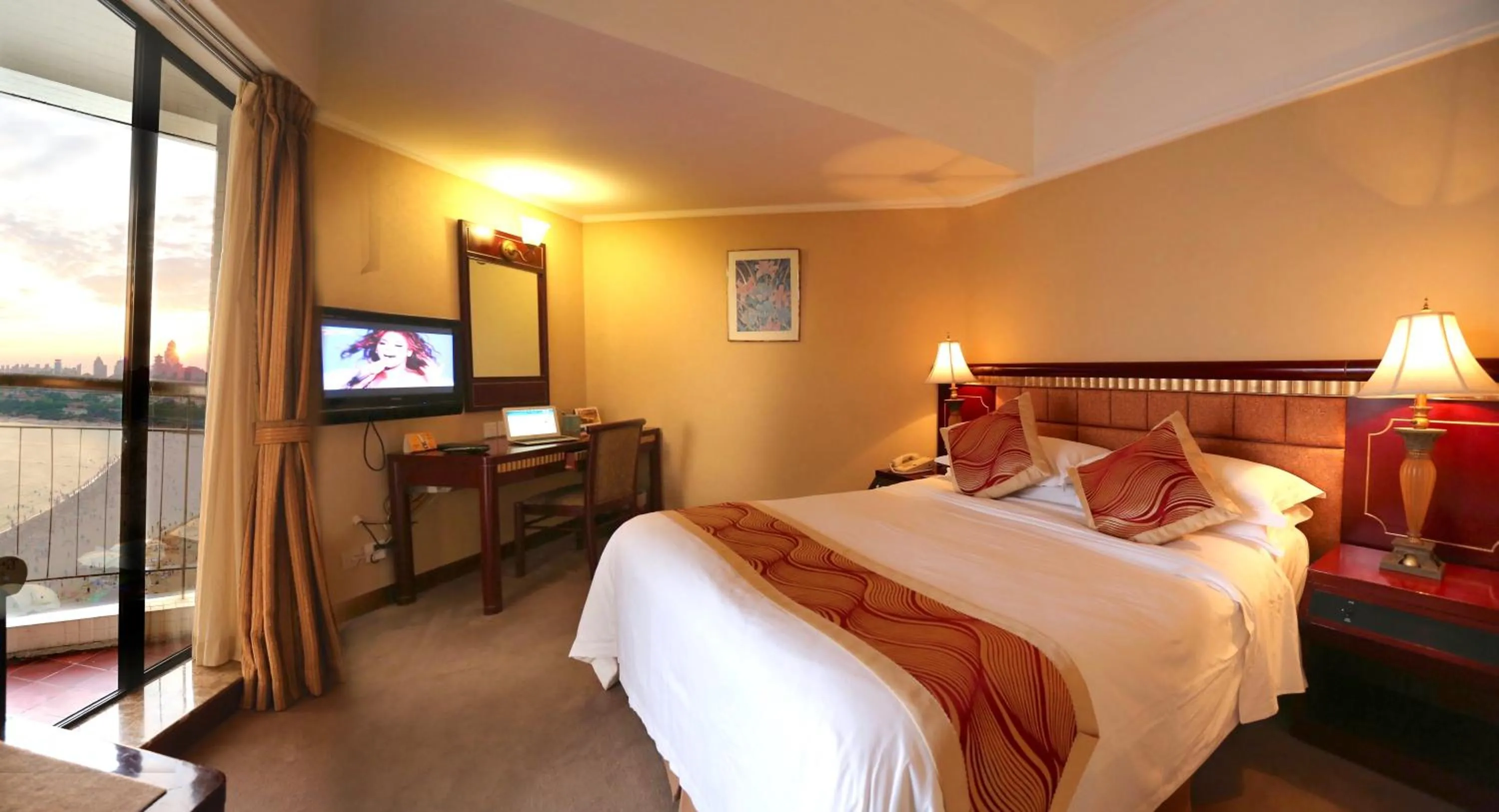 Bed in Huiquan Dynasty Hotel Qingdao