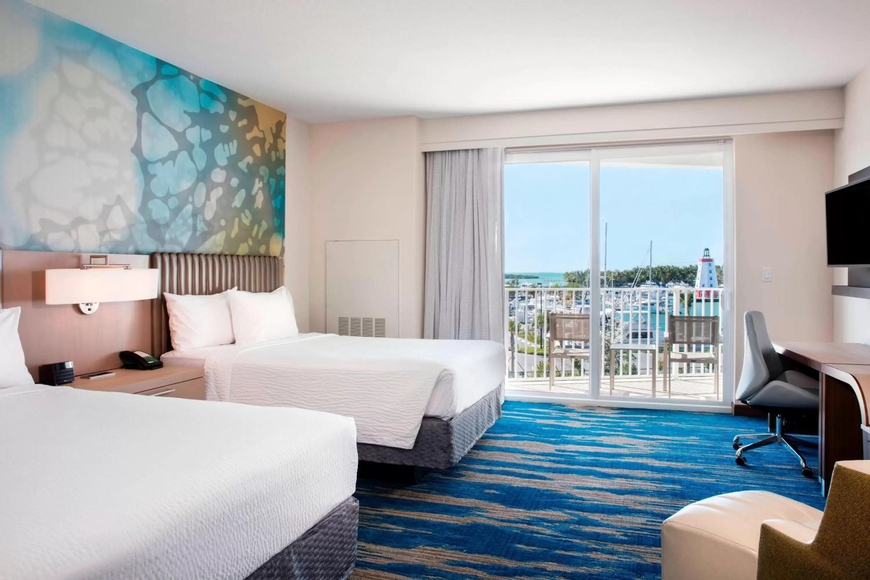 Photo of the whole room, Bed in Courtyard by Marriott Faro Blanco Resort