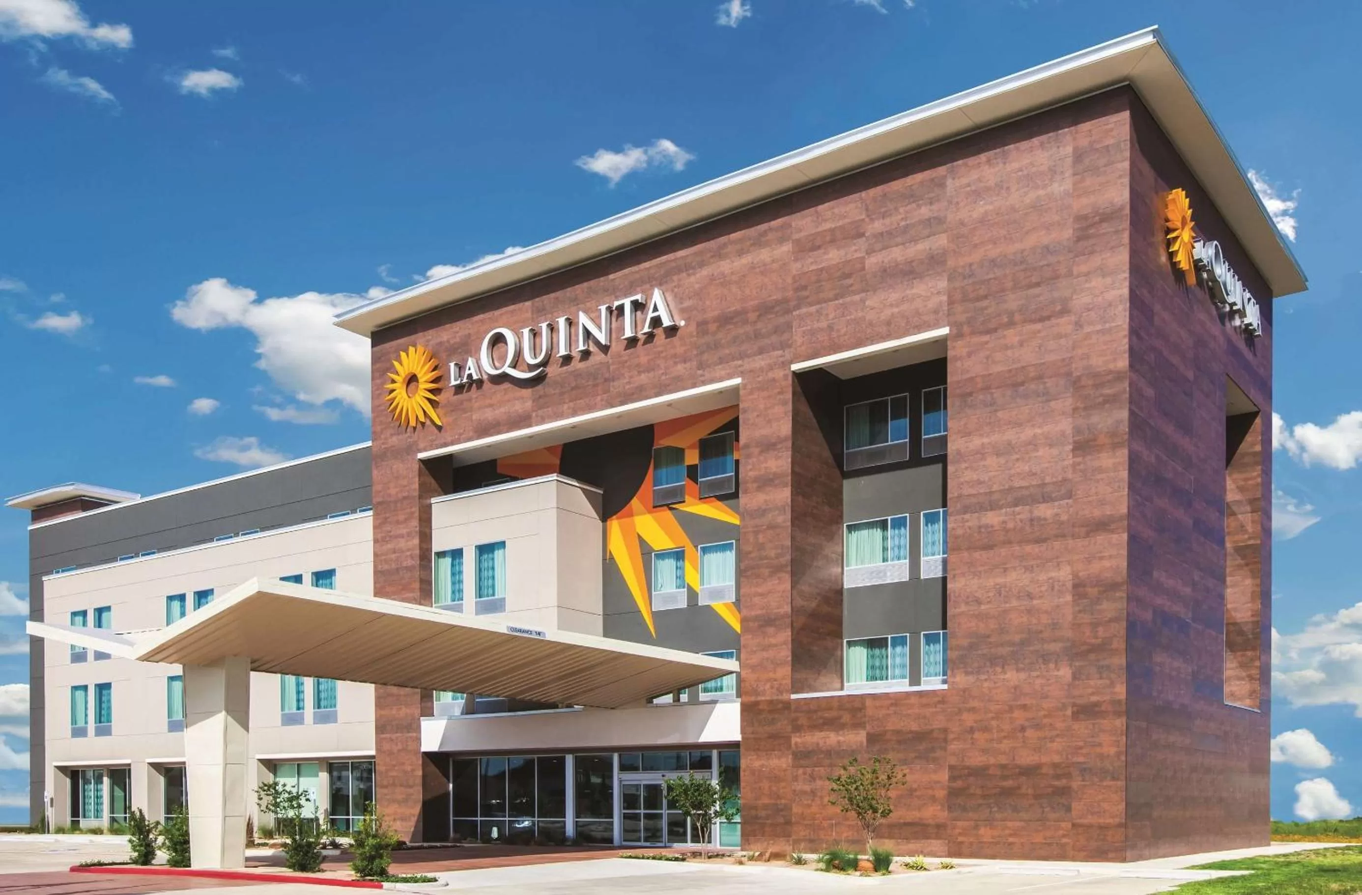Property building in La Quinta Inn and Suites by Wyndham Bloomington