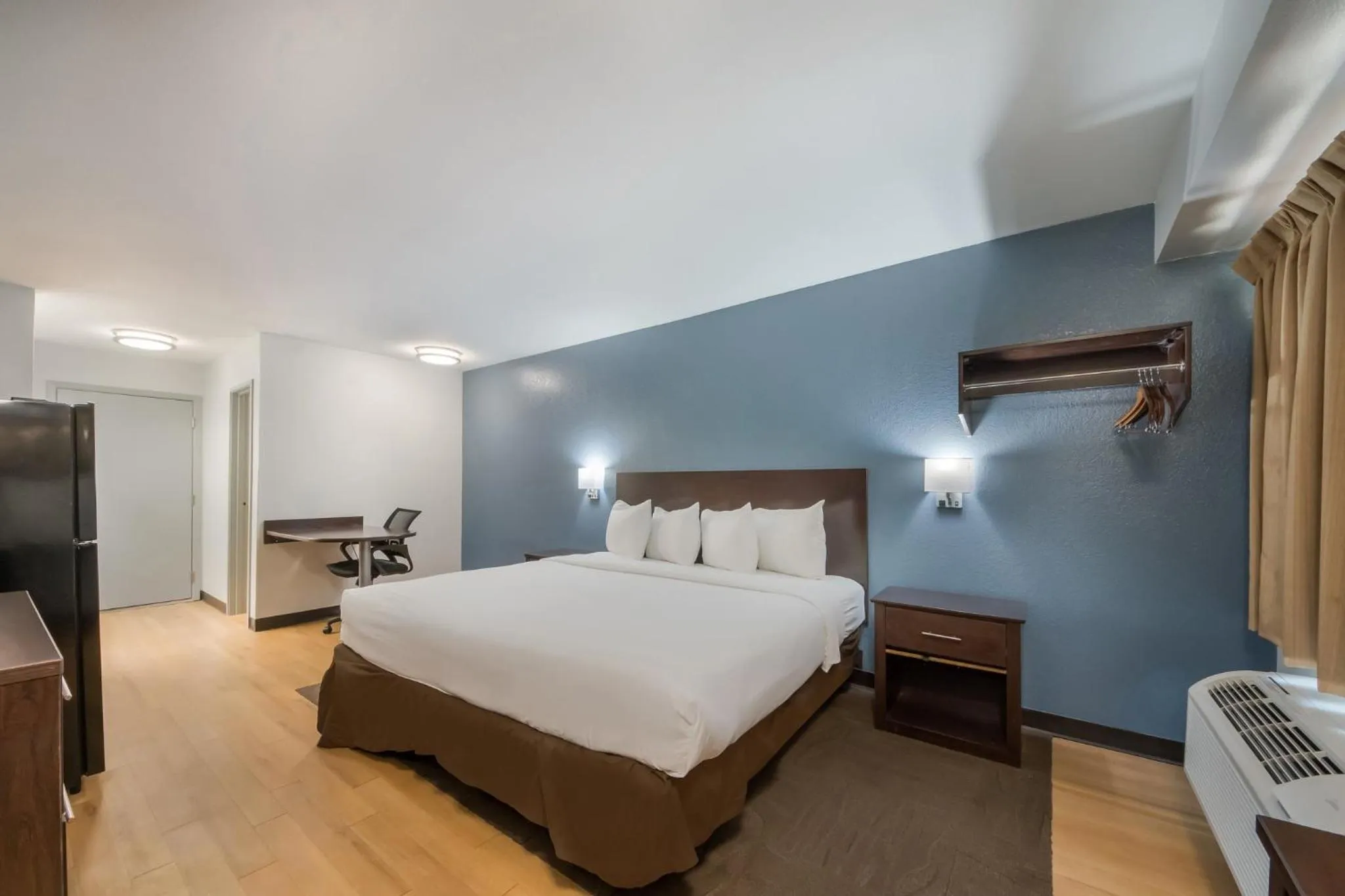 Bedroom, Bed in HomeTowne Studios by Red Roof San Antonio - SeaWorld Northwest