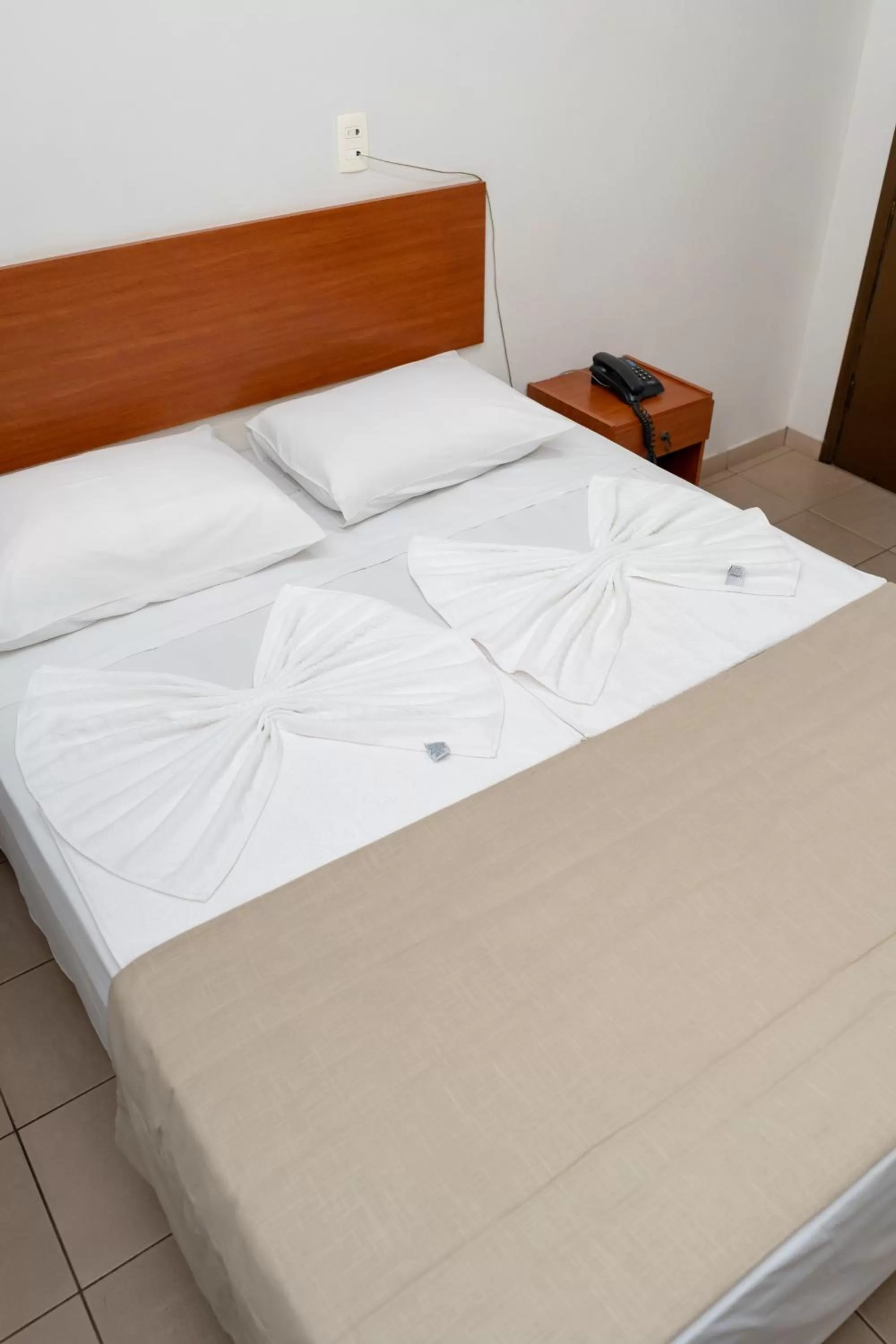 Bed in Bandeirantes Hotel