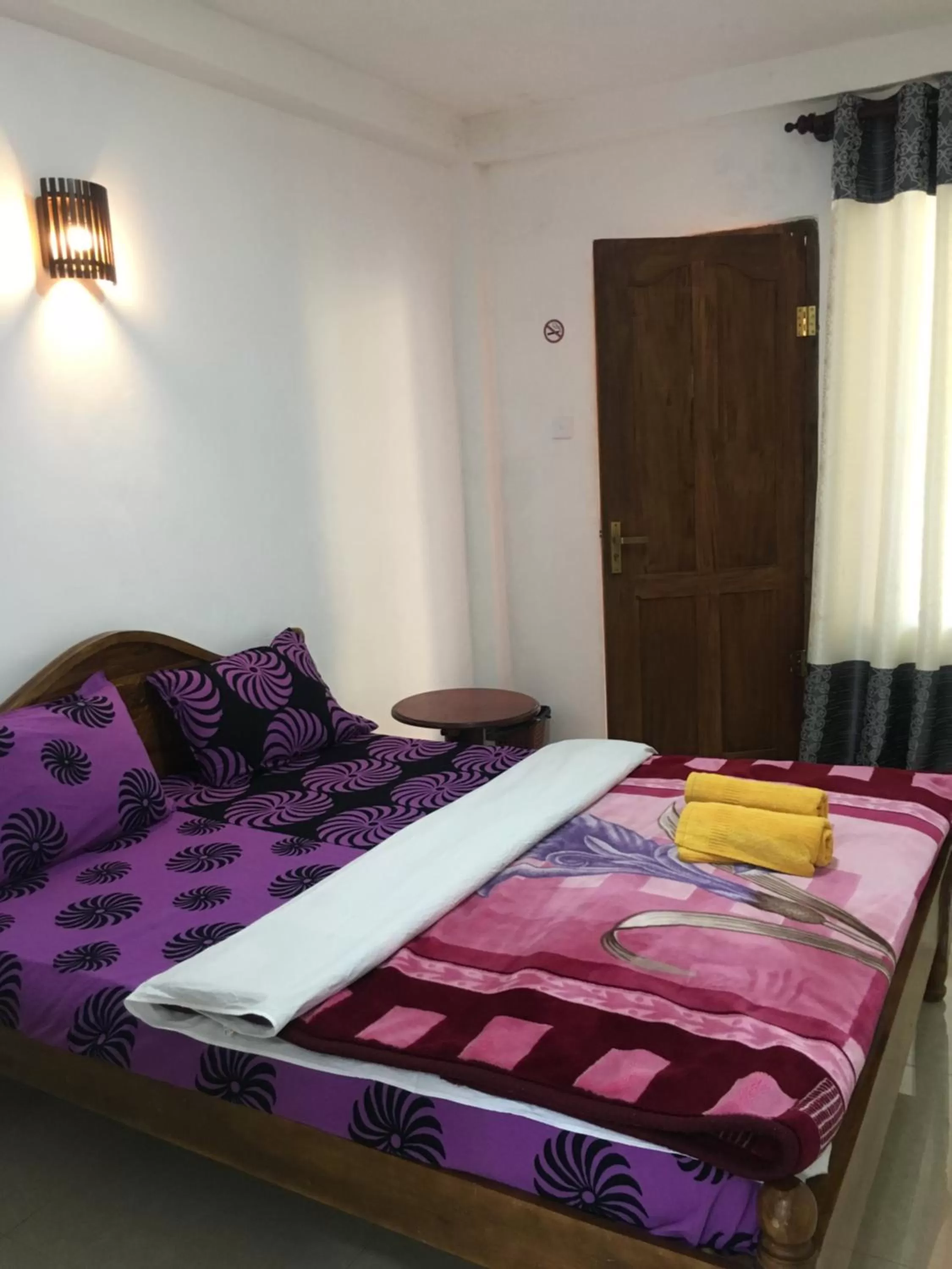 Bed in Golden King Guest