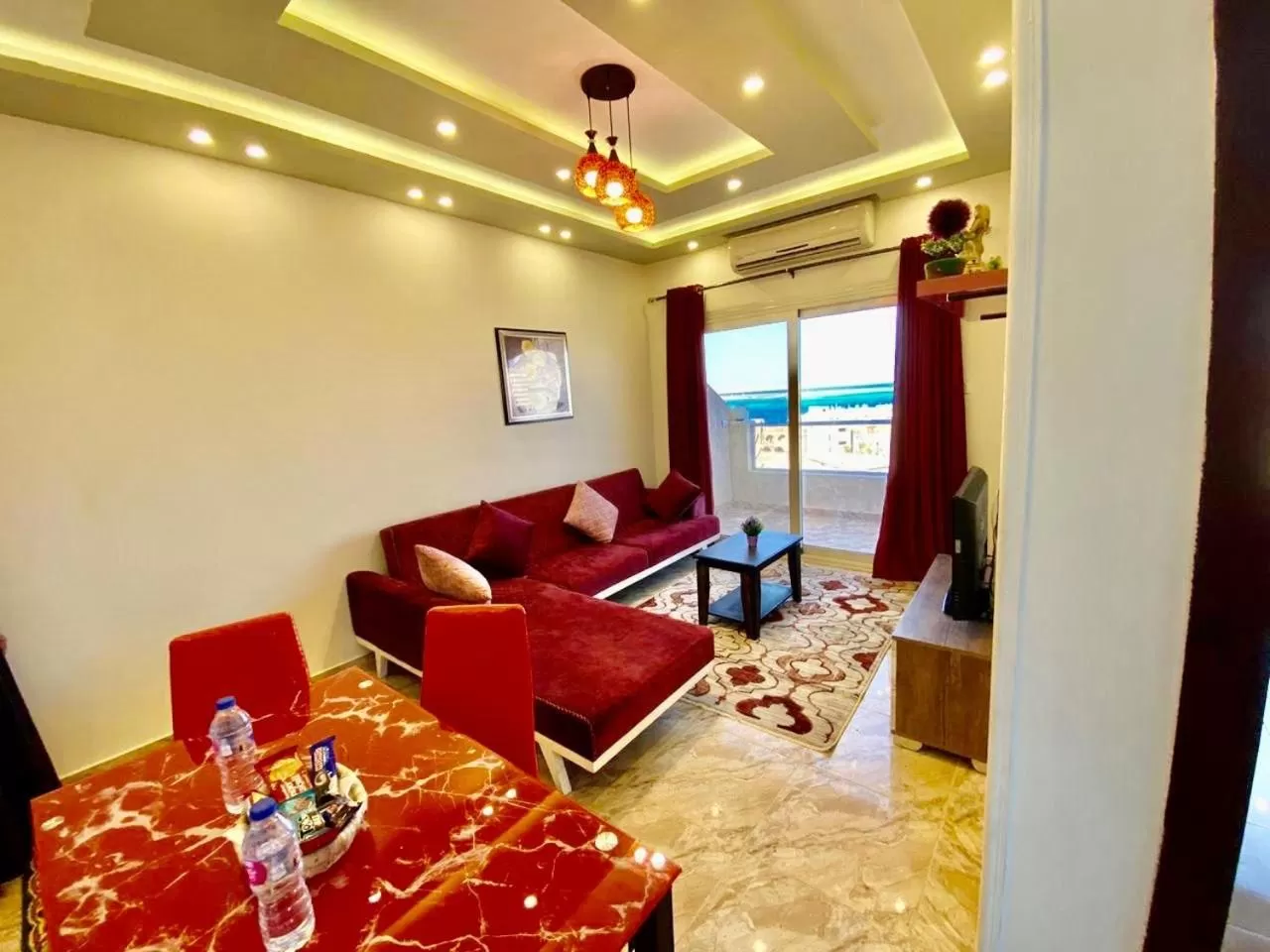 TV and multimedia, Seating Area in Charbel apartments