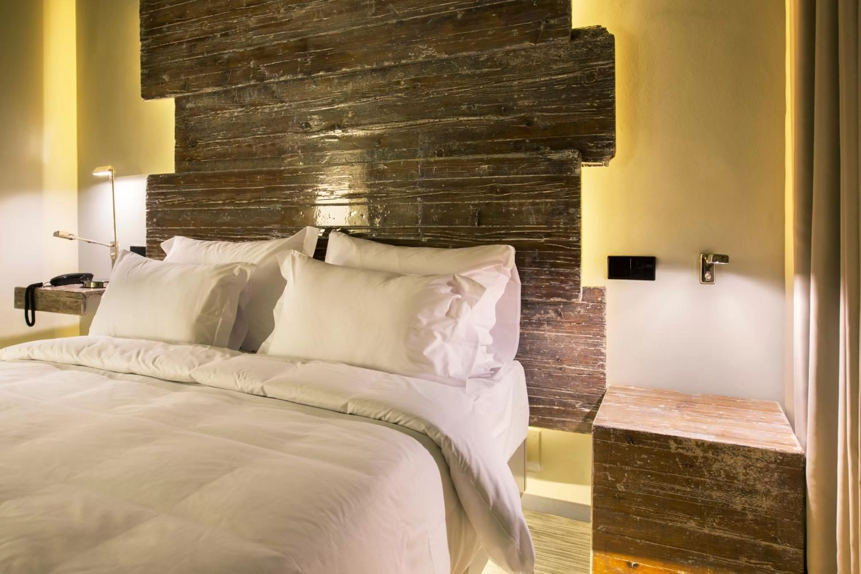 Bed in Vitoria Stone Hotel