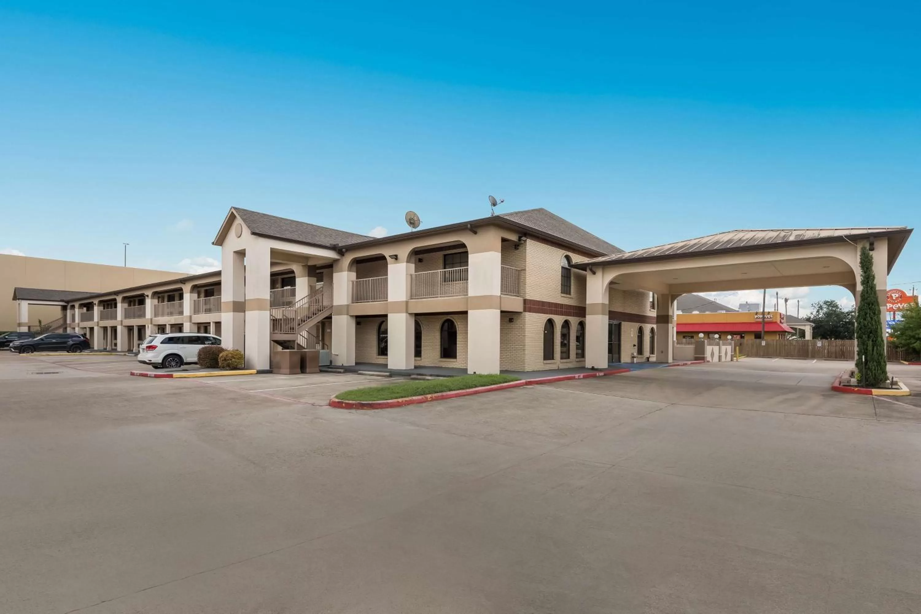 Property building in SureStay Hotel by Best Western Deer Park