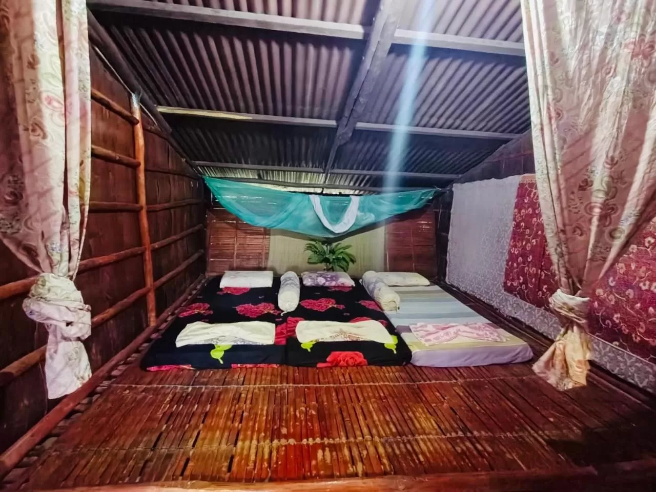 Bed in Dragon Pearl Beach Resort