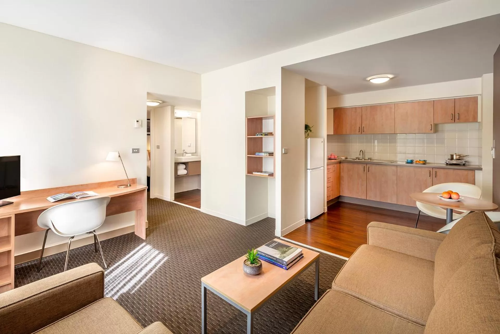 Kitchen or kitchenette in ibis Melbourne Hotel and Apartments