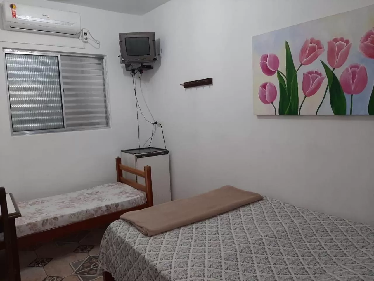 Bed in Pousada Canoas