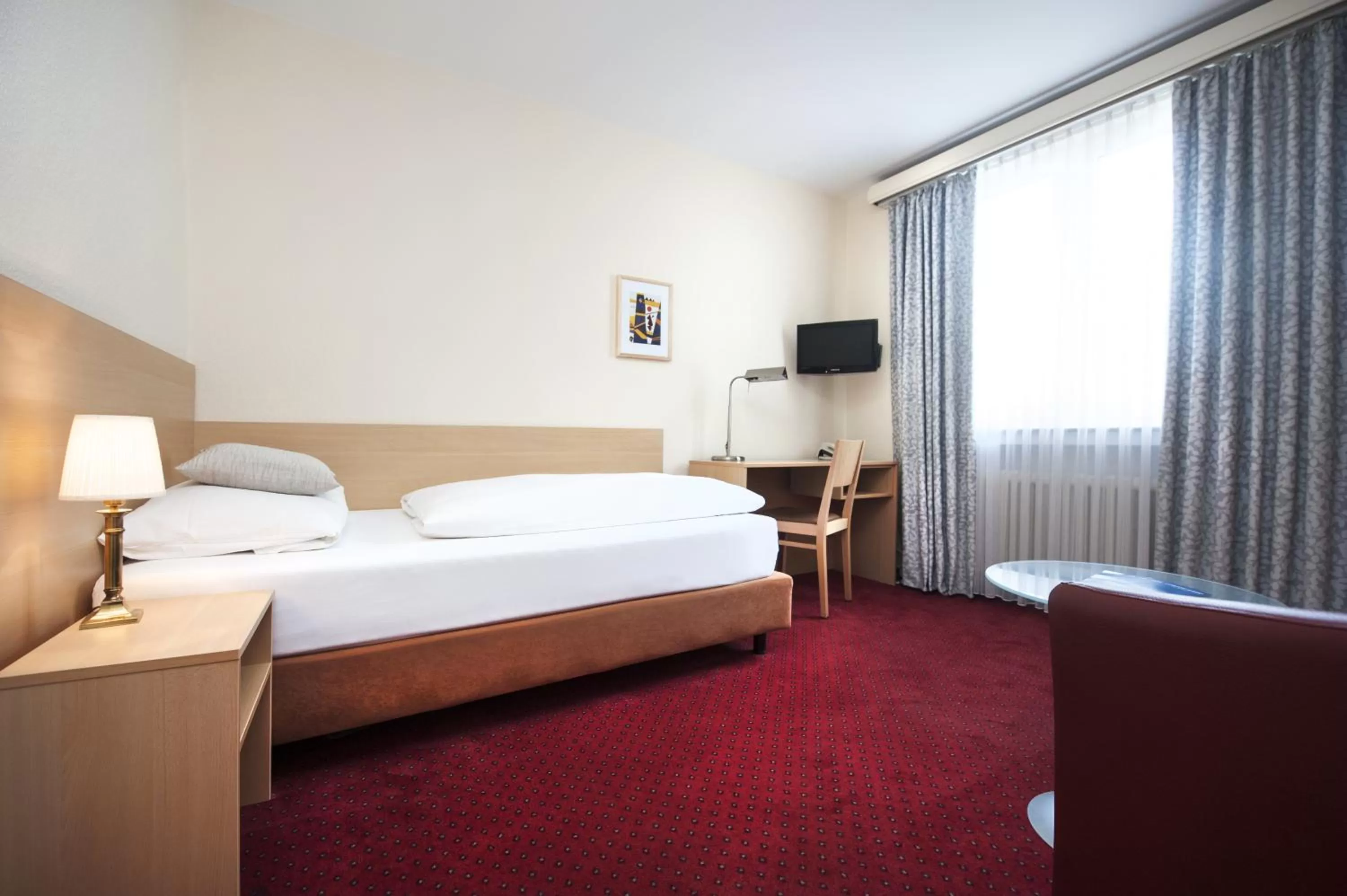 Photo of the whole room, Bed in Comfort Garni Stadtzentrum Hotel