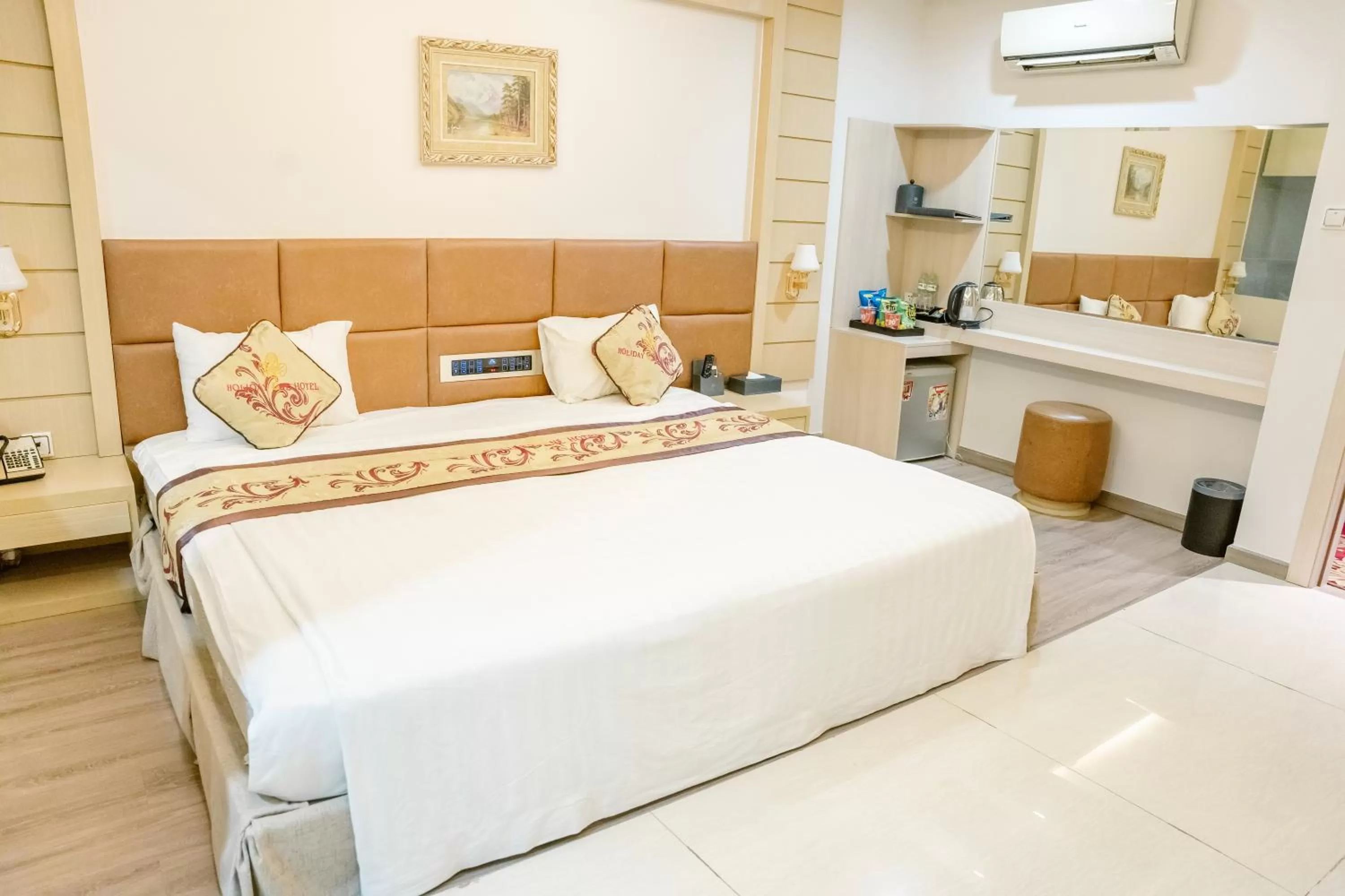 Bed in Holiday One Can Tho Hotel