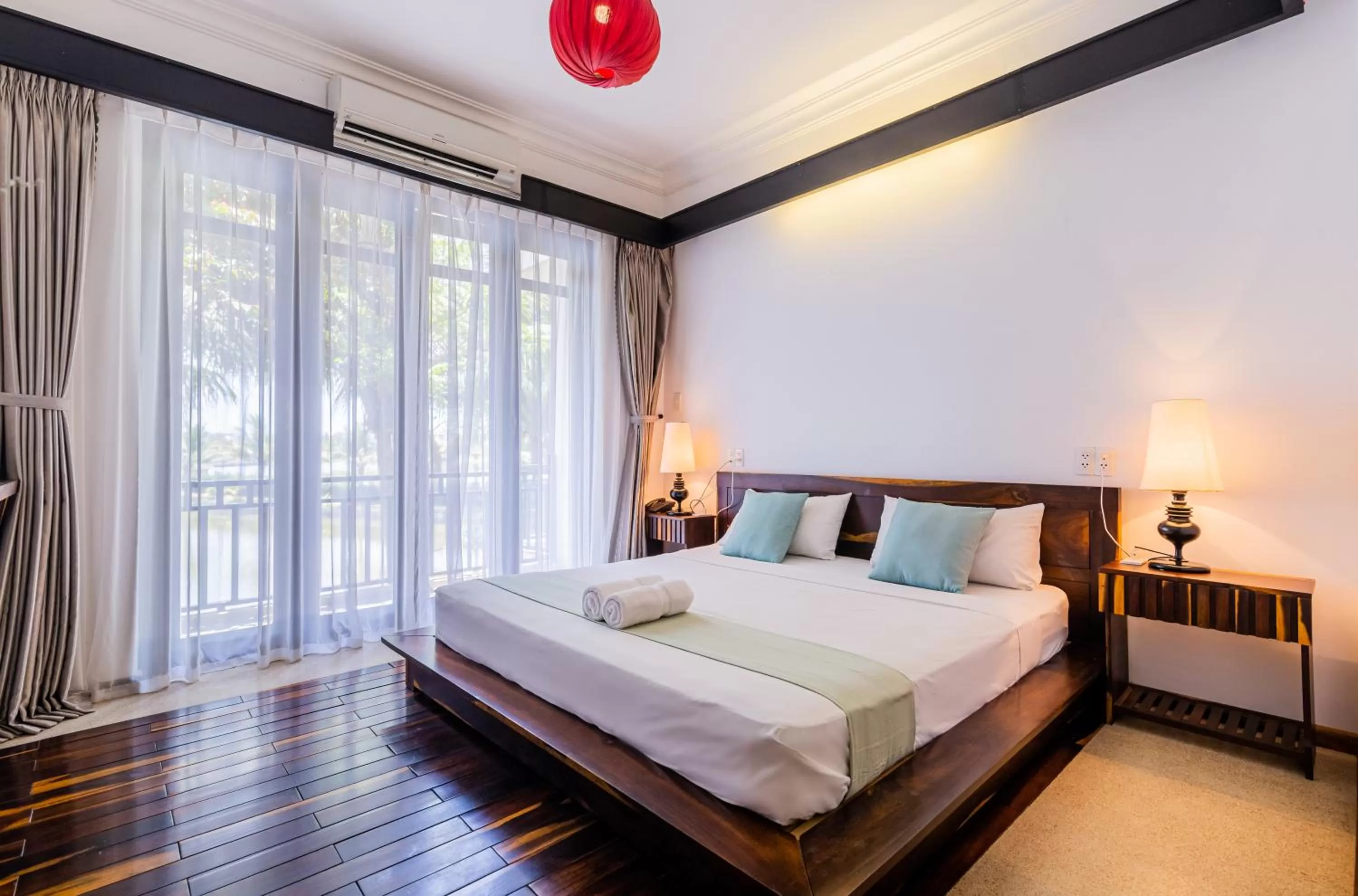 Photo of the whole room, Bed in Tra Que Mansion