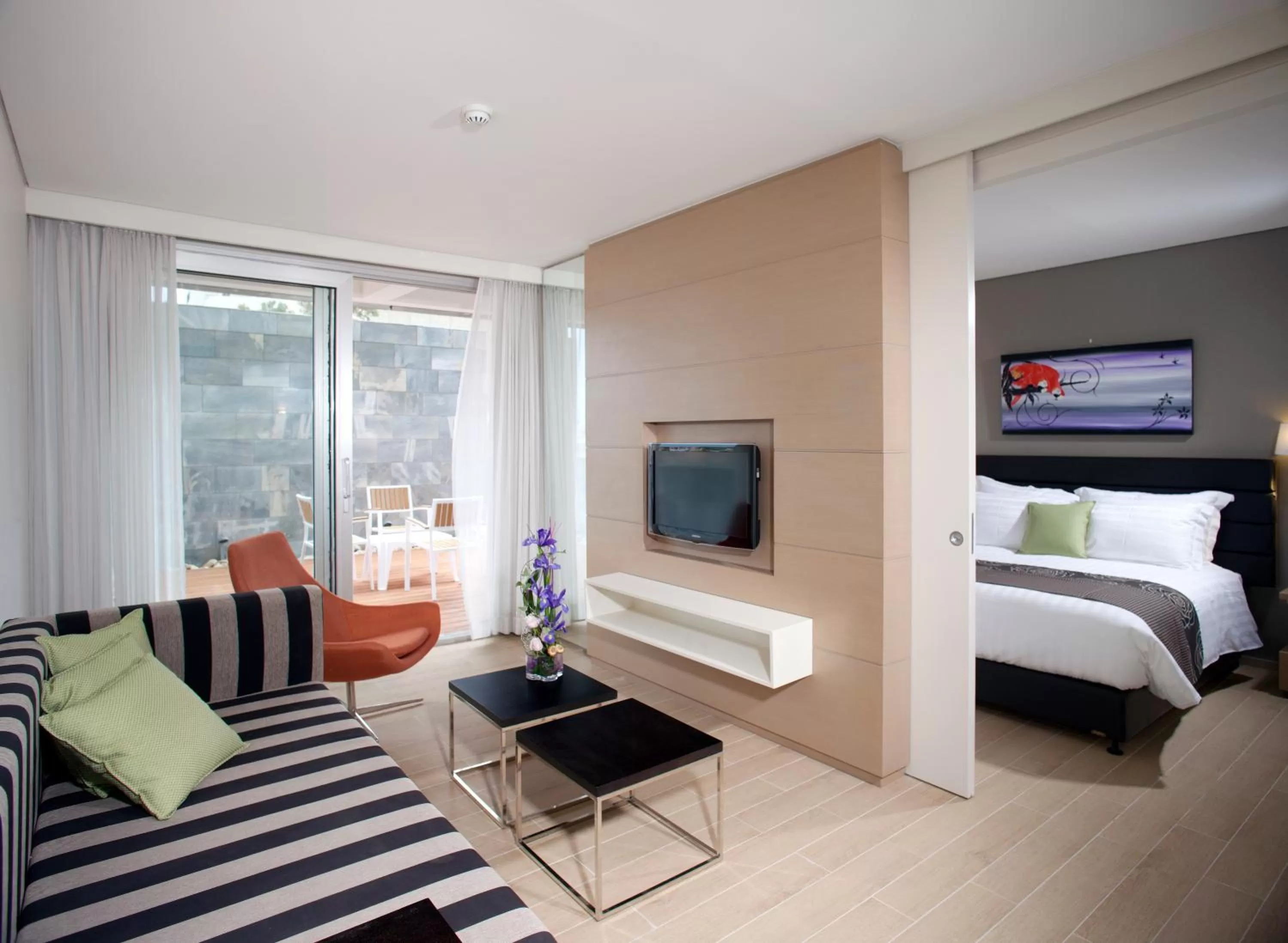 Living room, Bed in West All Suites Hotel Ashdod