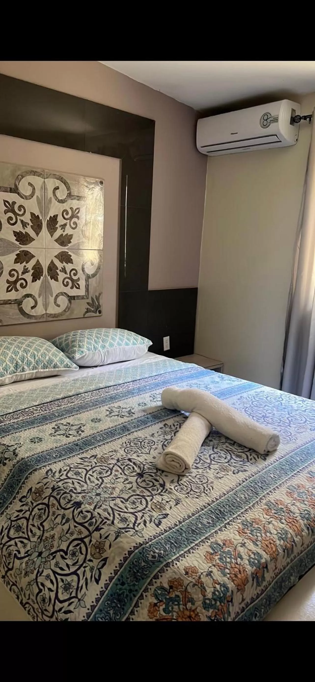 Bed in Curasita colour Appartments