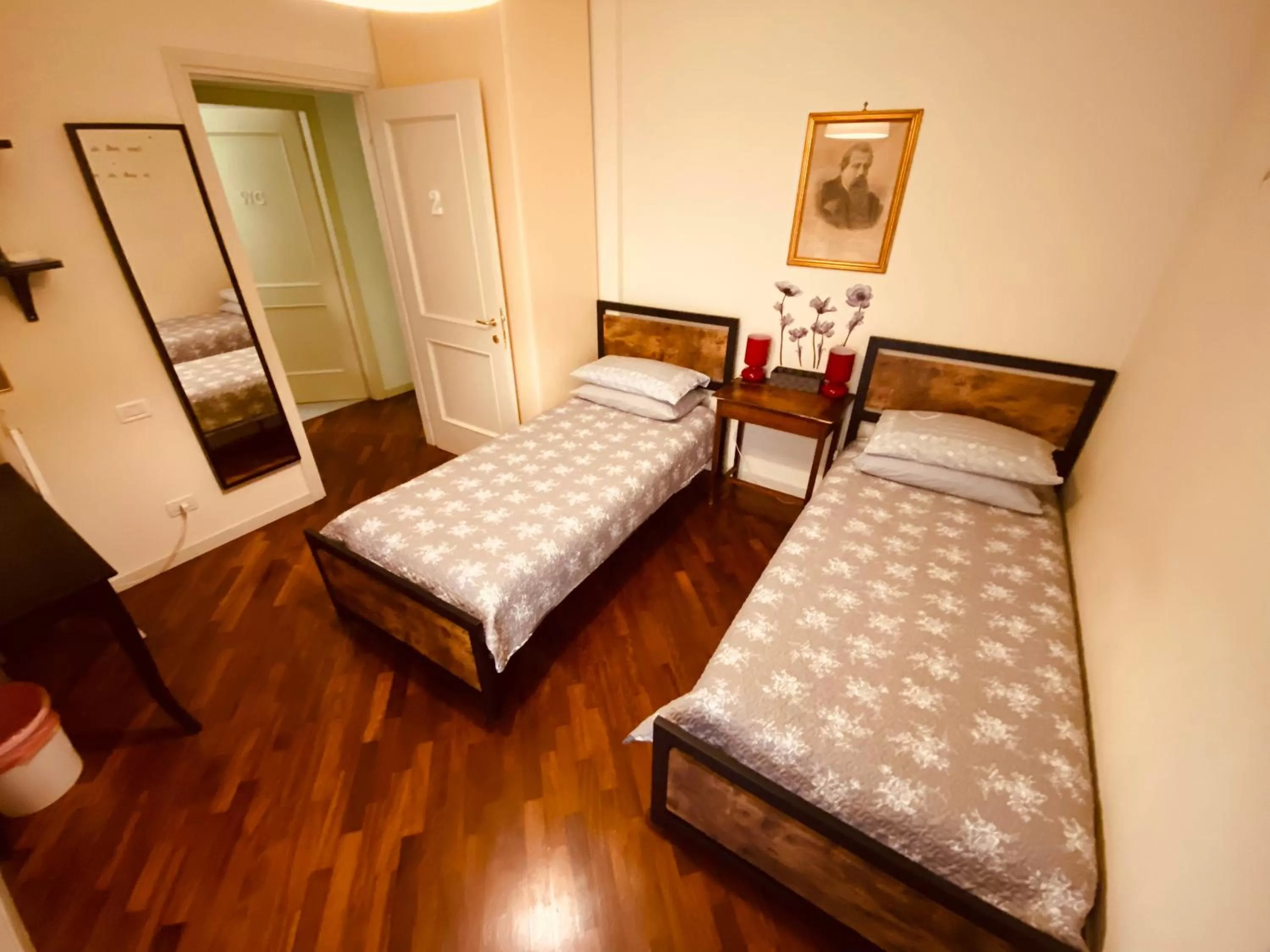 Bed in Amici Miei Rooms