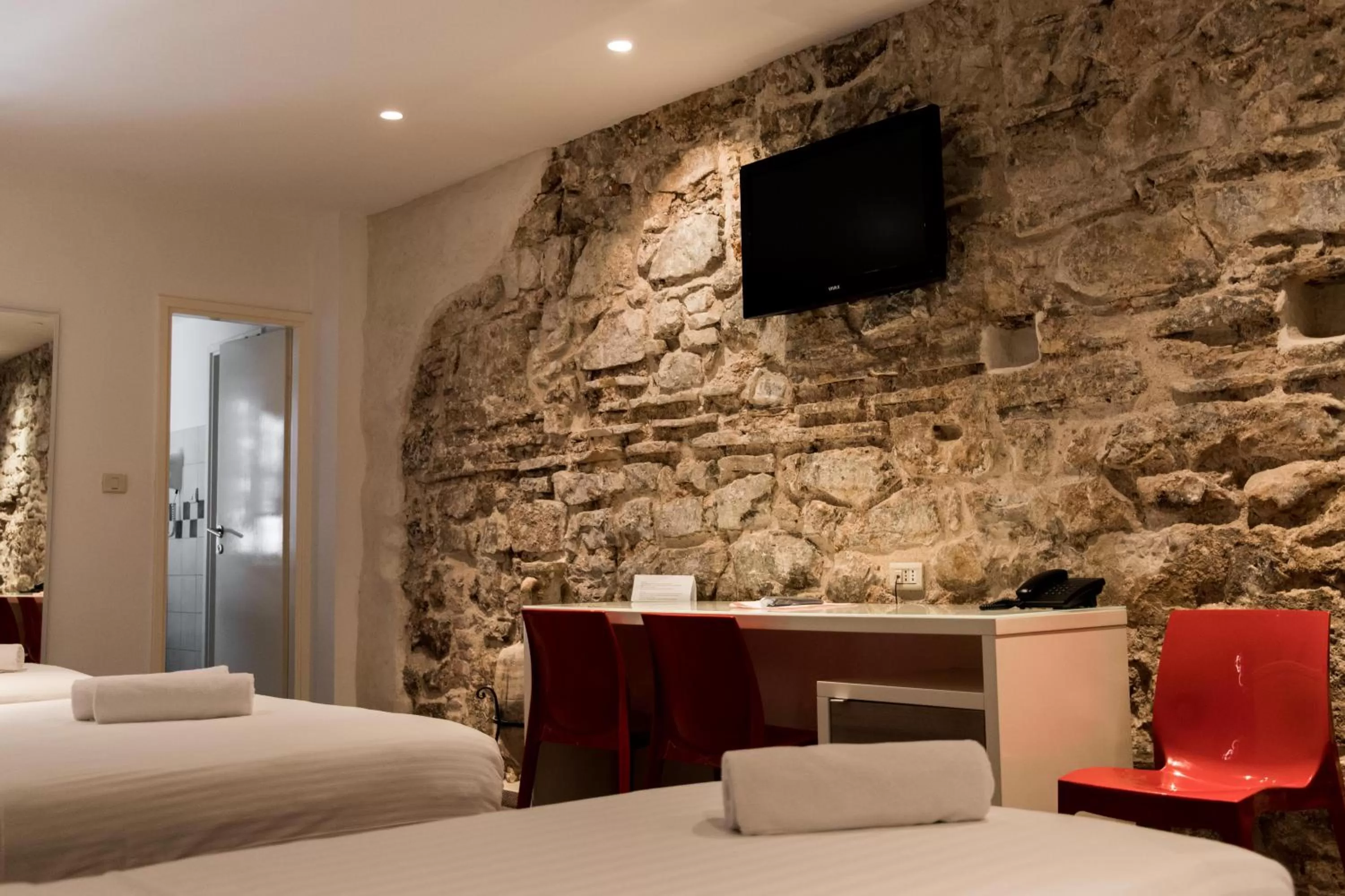 Bed in Slavija Culture Heritage Hotel