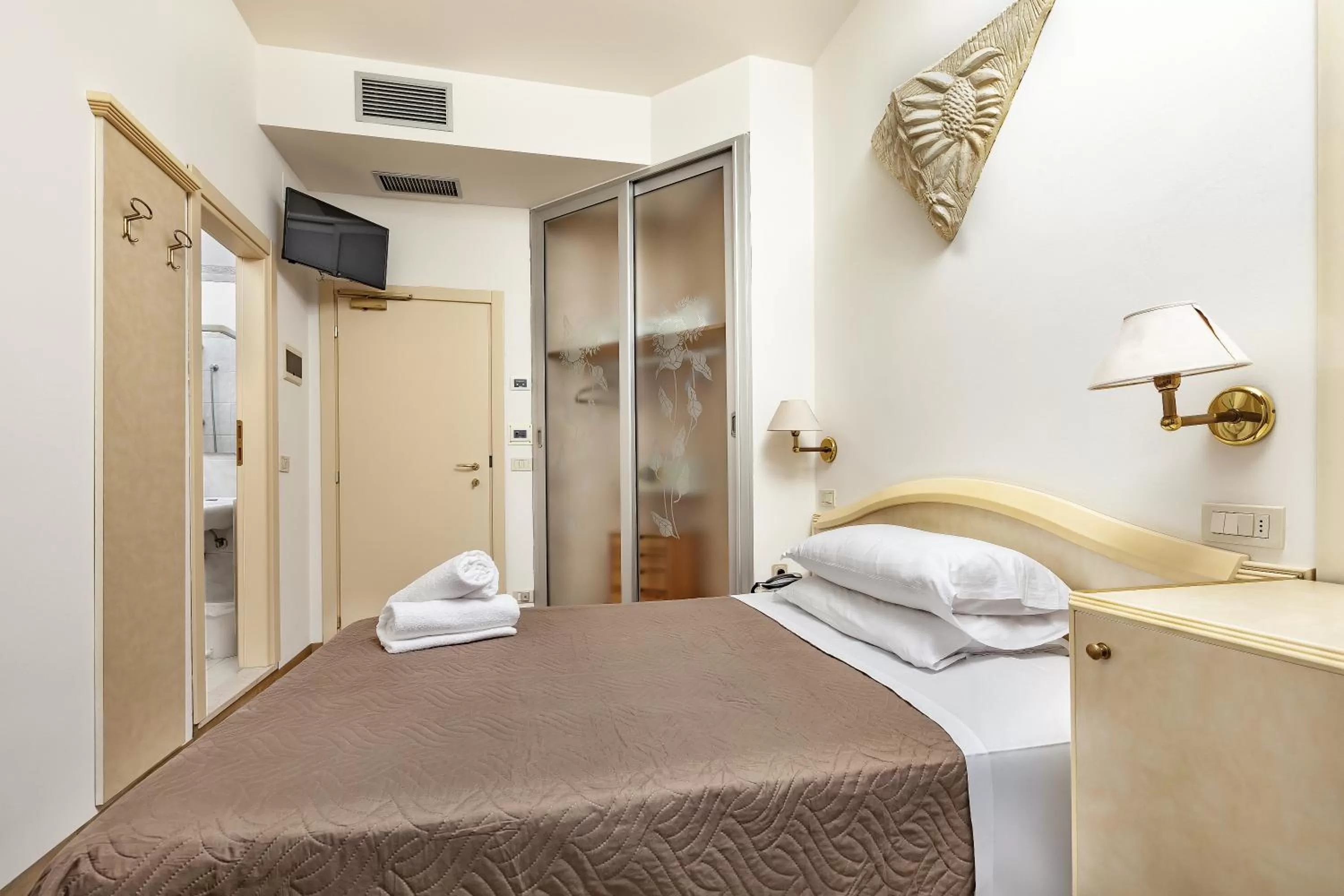 Bed in Ariminum Hotel